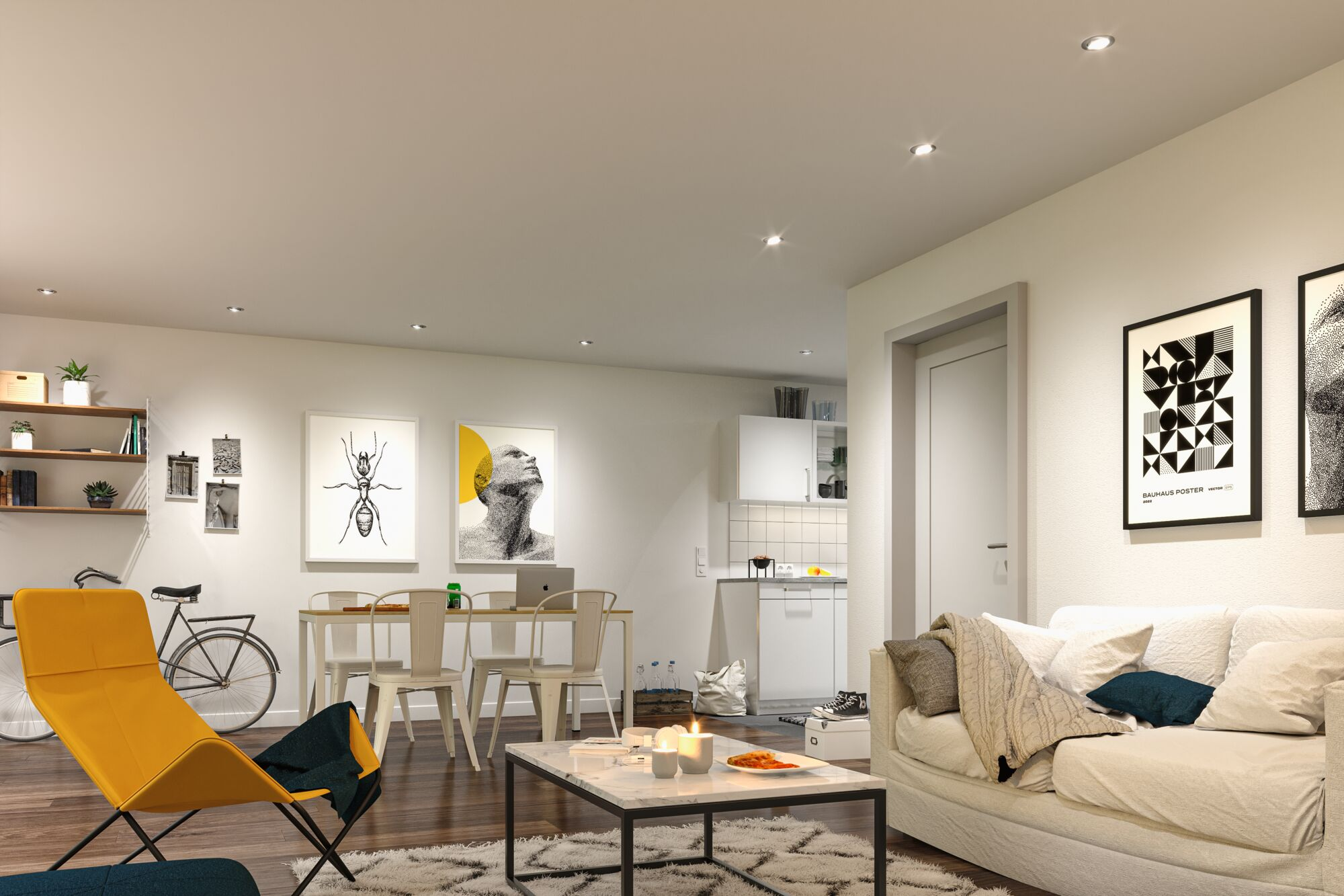 Salon z żółtym krzesłem, rowerem, stołem jadalnym, sofą, sztuką i kuchnią w tle. Świece na stole.