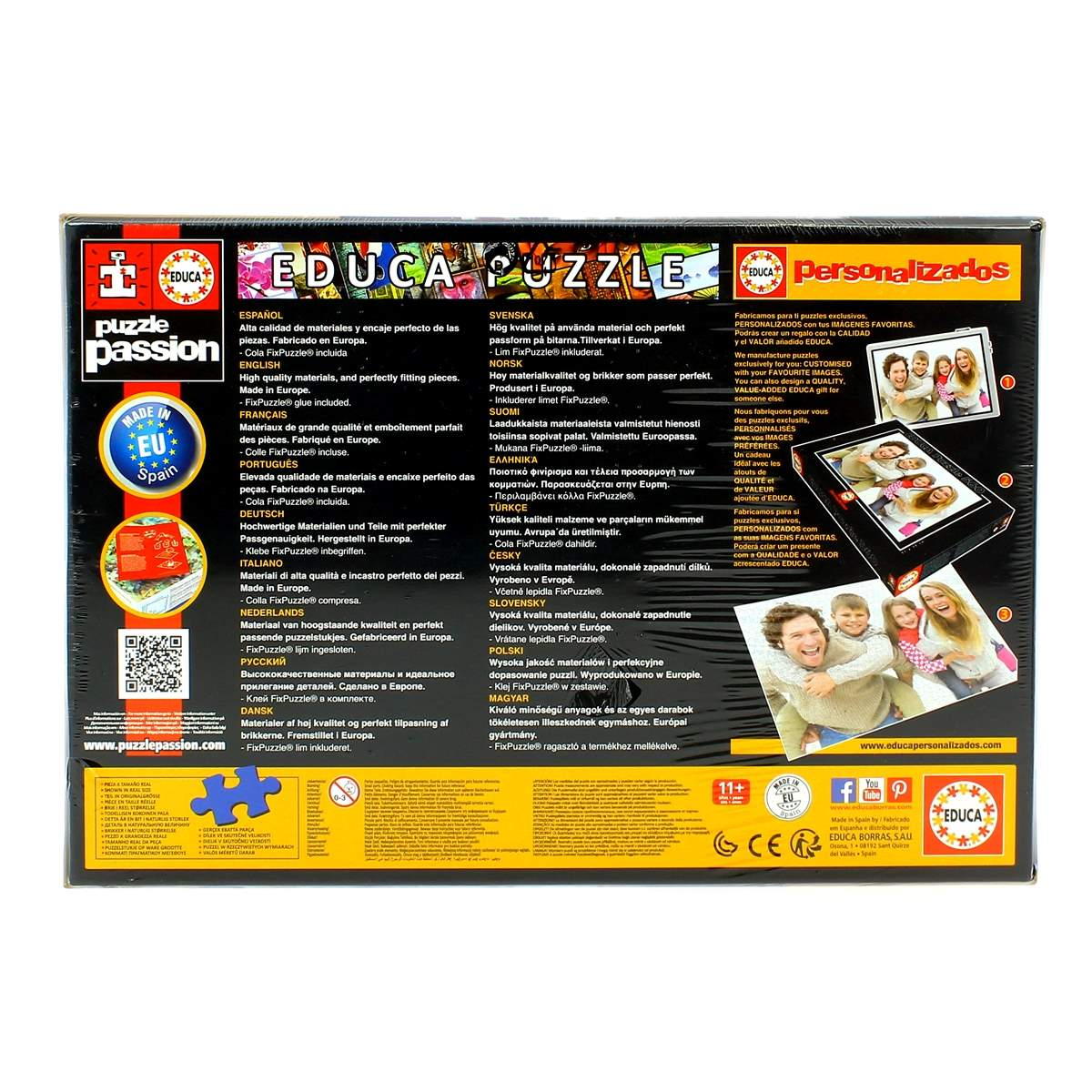 Pudełko z puzzlami z tekstem w wielu językach, pokazujące obraz ułożonych puzzli i rodzinę.