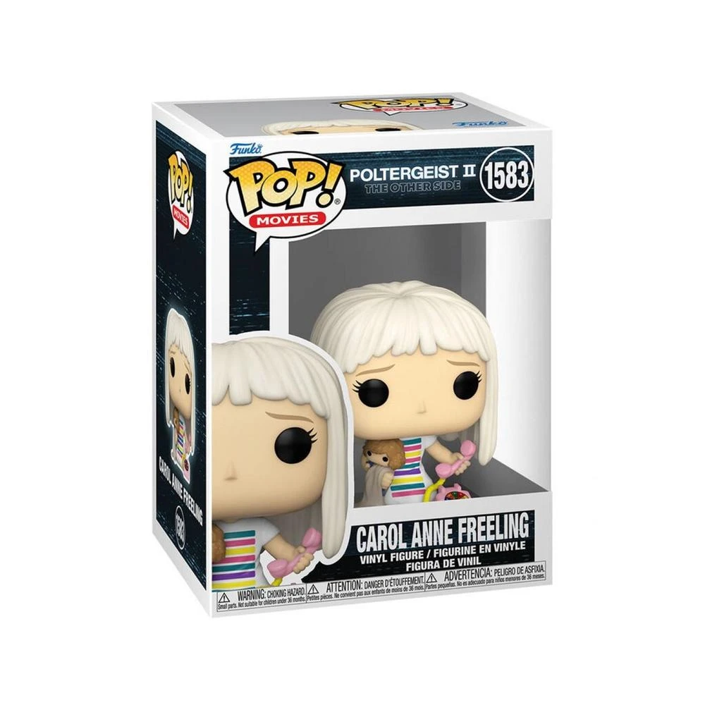 Figura Funko Pop! di Carol Anne Freeling di Poltergeist II. Tiene in mano un telefono rosa e un orsacchiotto. La scatola è bianca.