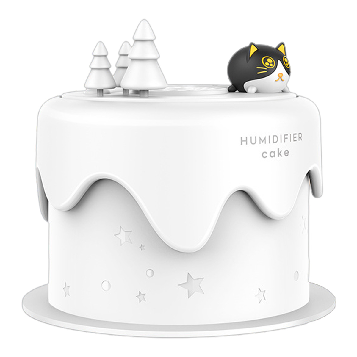 Ein weißer Luftbefeuchter in Kuchenform mit Sternausschnitten. Er hat kleine Bäume und eine Katzenfigur oben drauf. Der Text lautet 'HUMIDIFIER cake'.