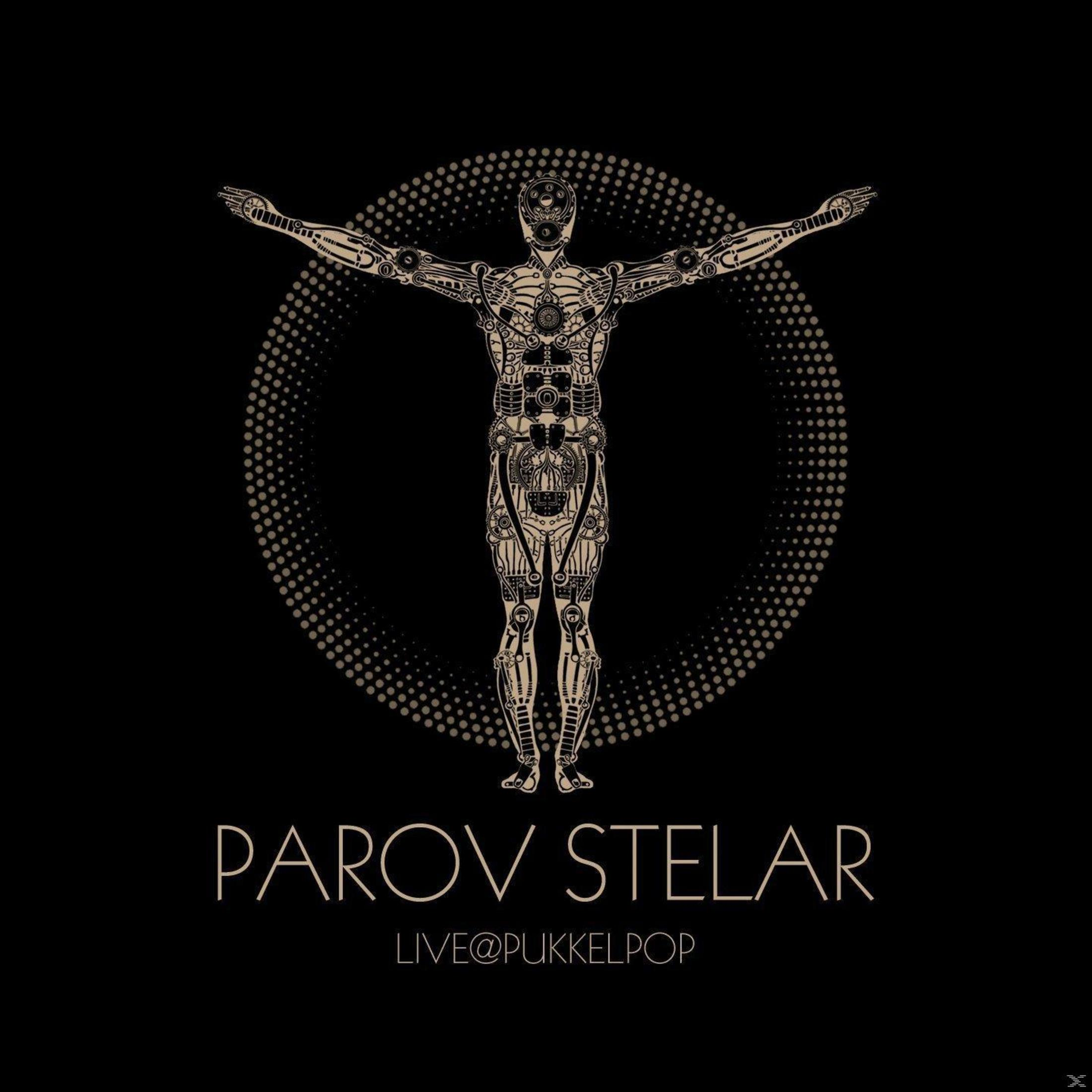 A cyborg illustration with arms outstretched stands against a dotted circle on a black background, with text below.