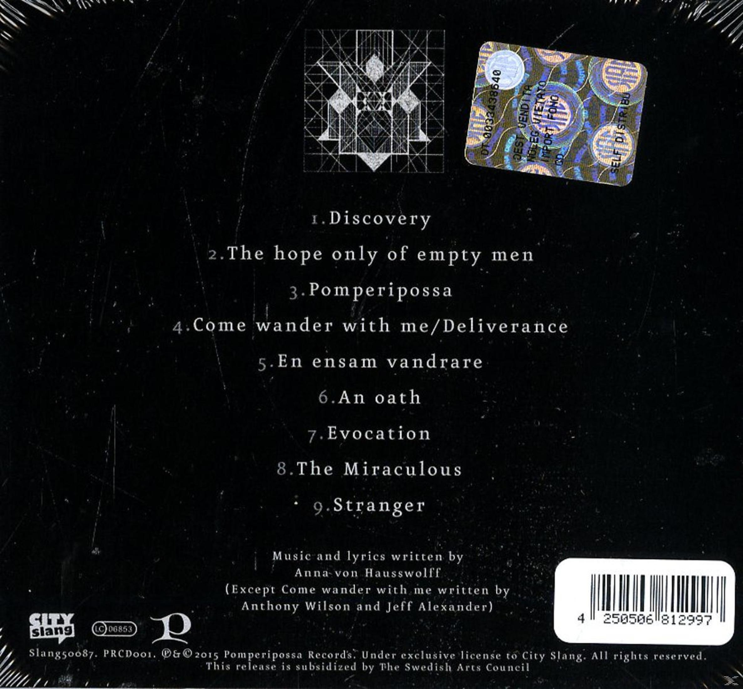 Schwarzes Albumcover mit Titelliste, geometrischem Design und Aufkleber mit Text. Weißer Text auf dunklem Hintergrund.