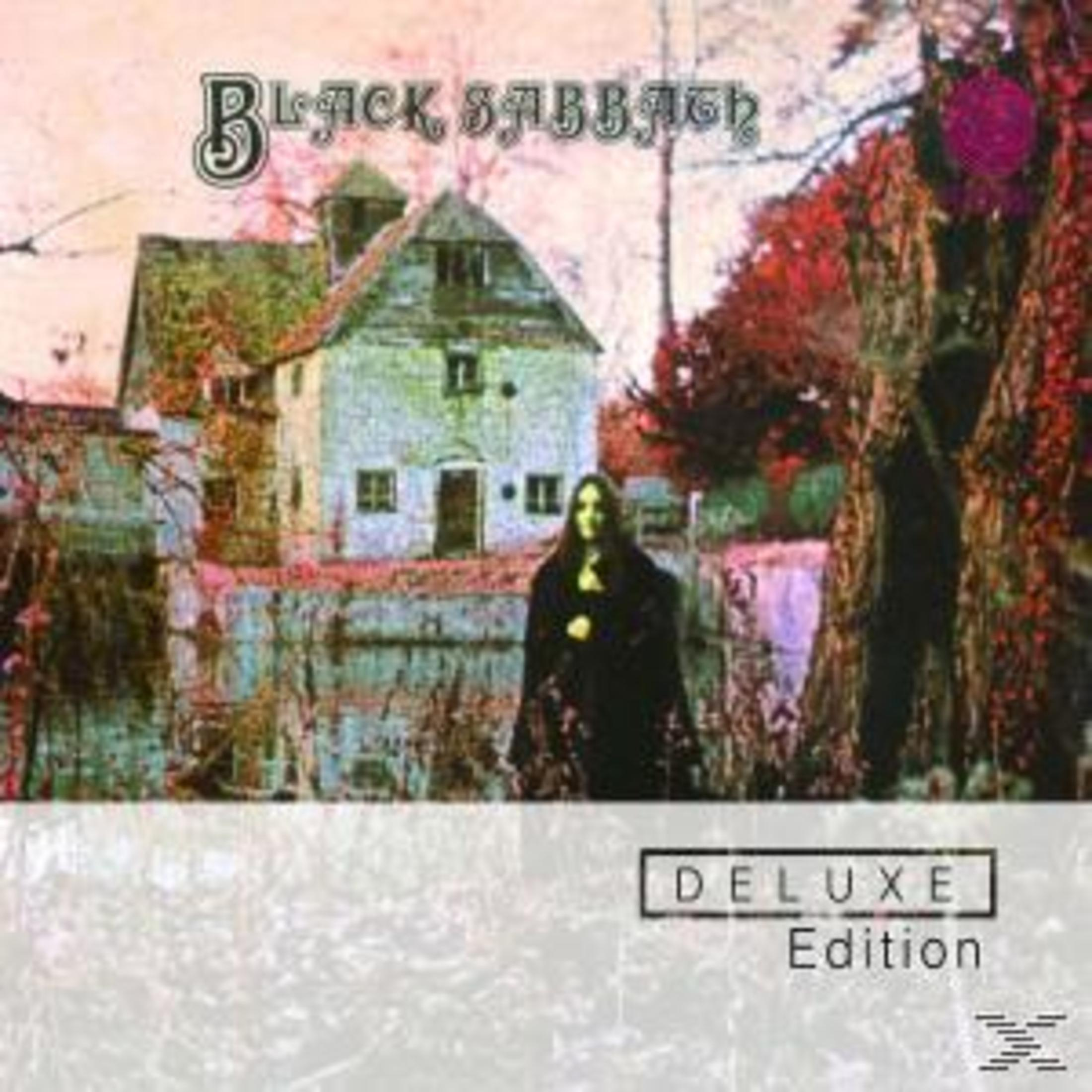 Albumcover. Eine Frau in Schwarz steht vor einem Haus. Titel: Black Sabbath. Deluxe Edition.