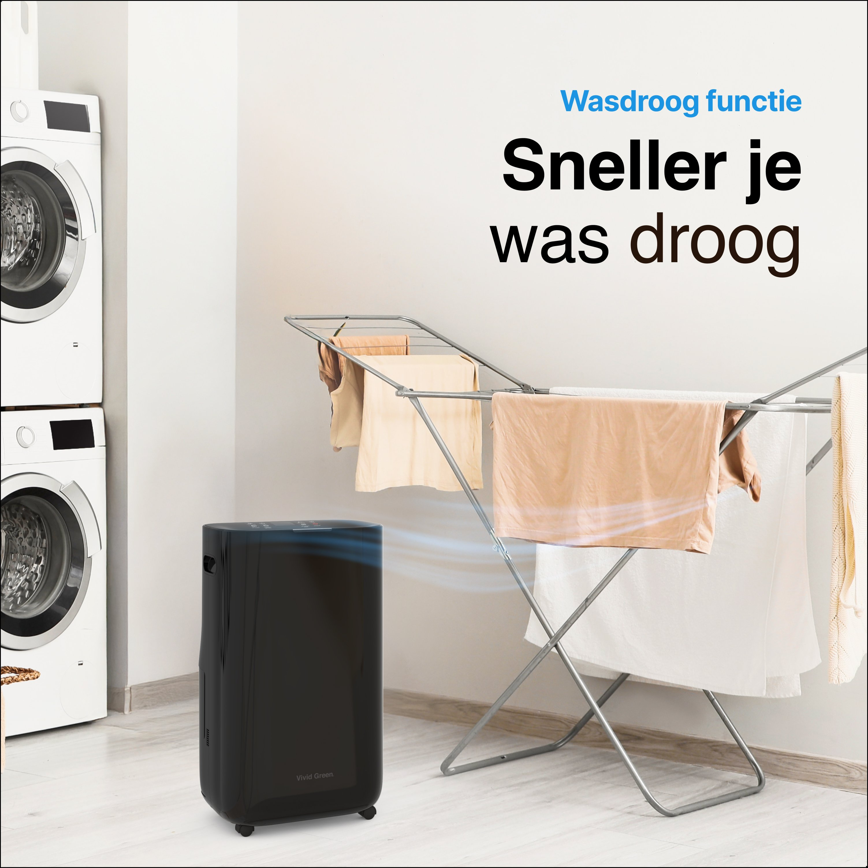 Een zwarte luchtontvochtiger met kleding die droogt op een rek. Twee witte wasmachines links.