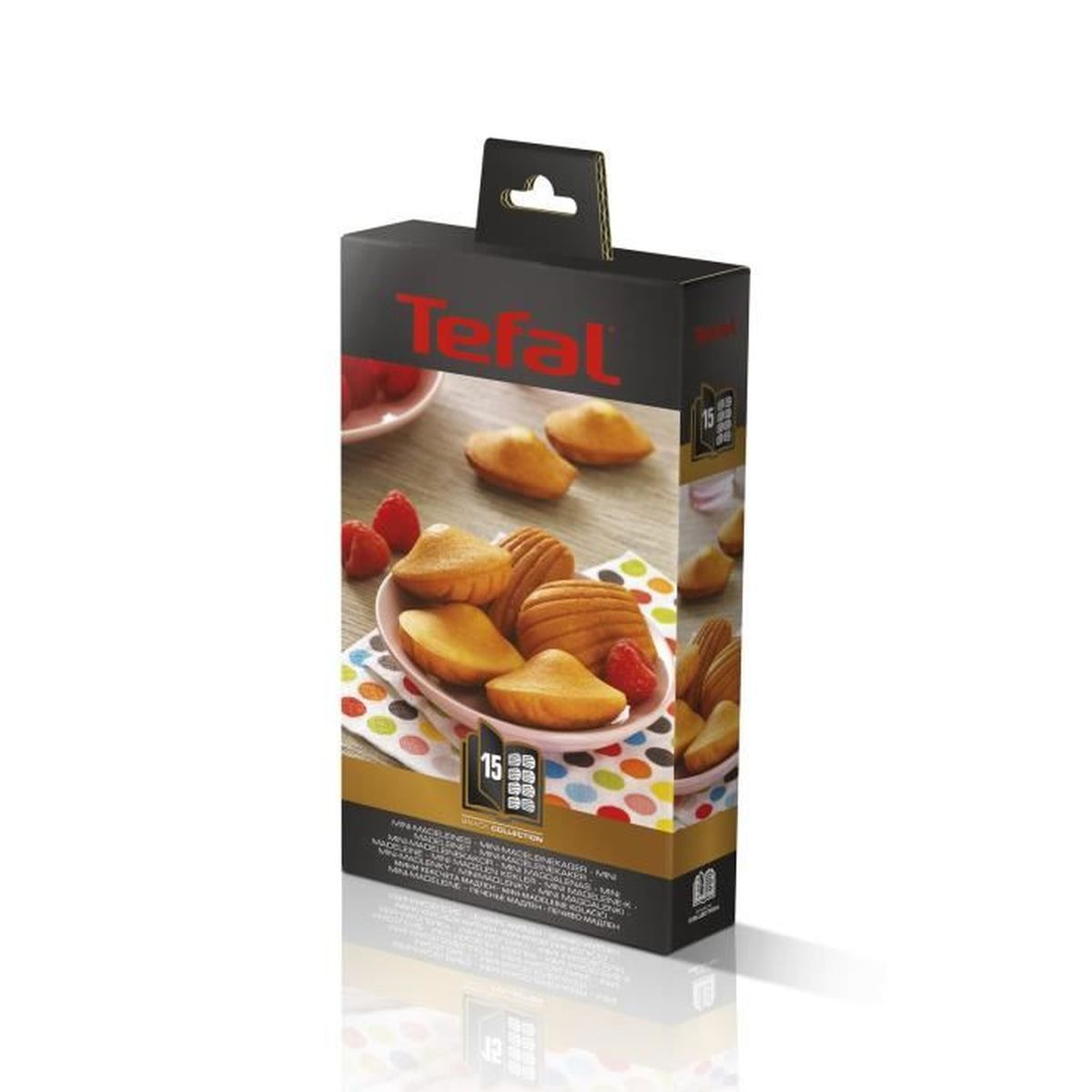 Eine Schachtel mit Tefal Mini-Madeleine-Kuchen. Auf der Schachtel sind die Kuchen mit Himbeeren auf einem Teller und einem bunten Tuch abgebildet.