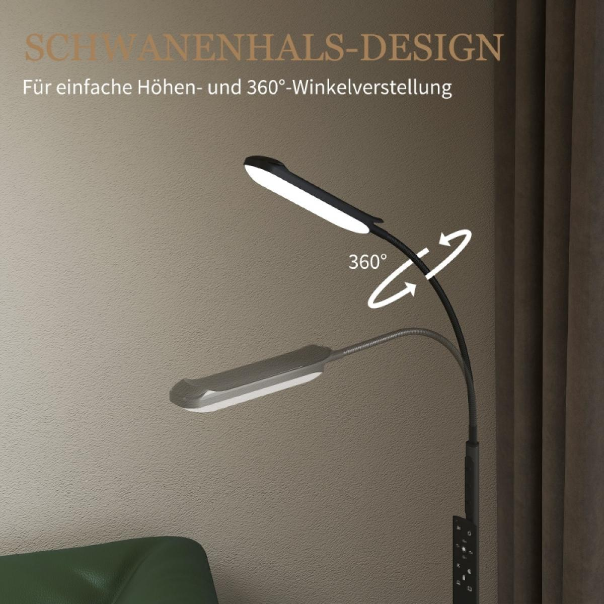 Eine schwarze und silberne LED-Stehleuchte mit verstellbarem Kopf. Sie hat einen flexiblen Hals und steht vor einer beigen Wand.