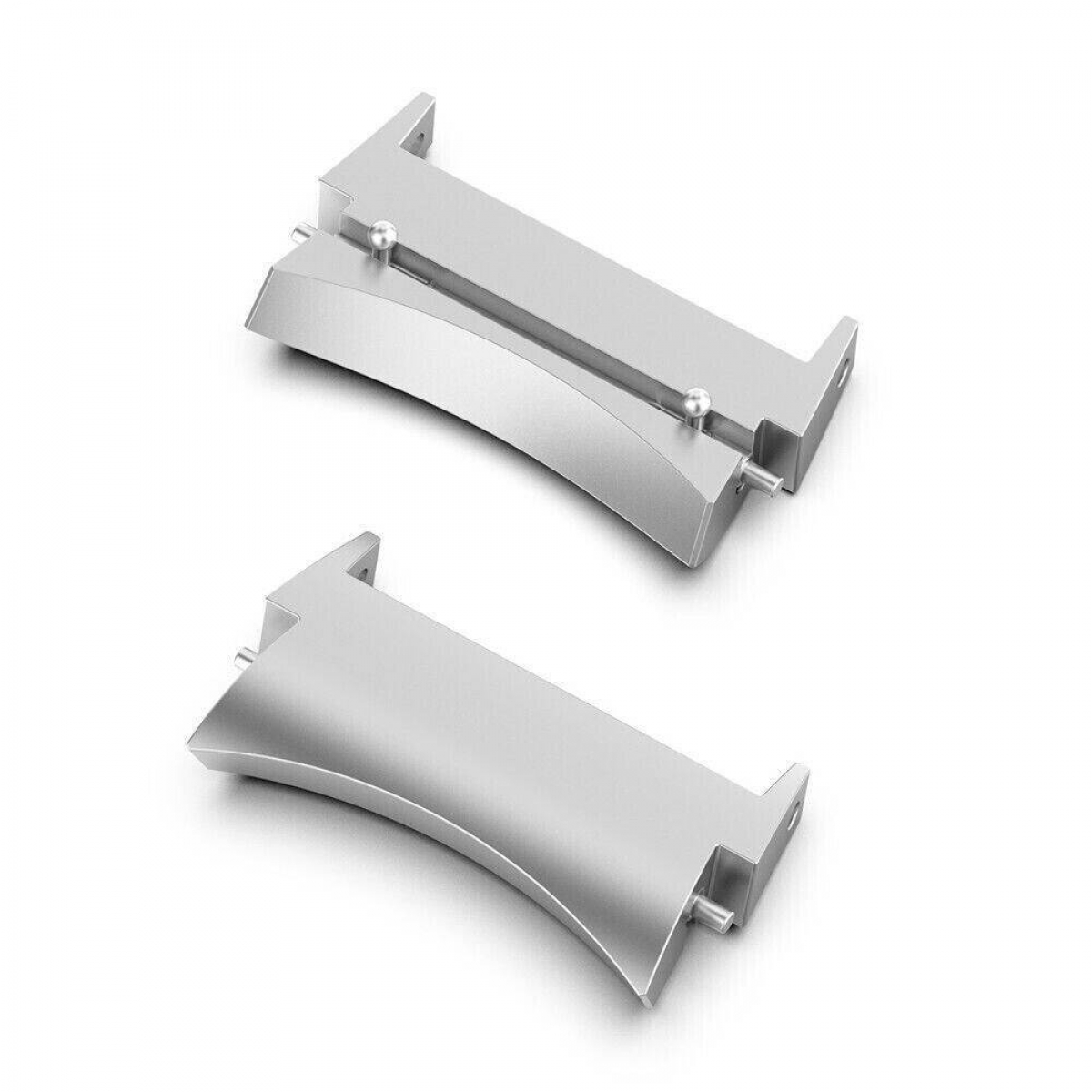 Zwei metallisch-silberne Objekte auf weißem Hintergrund. Jedes hat eine gebogene Basis und eine rechteckige Oberseite mit kleinen Stiften.