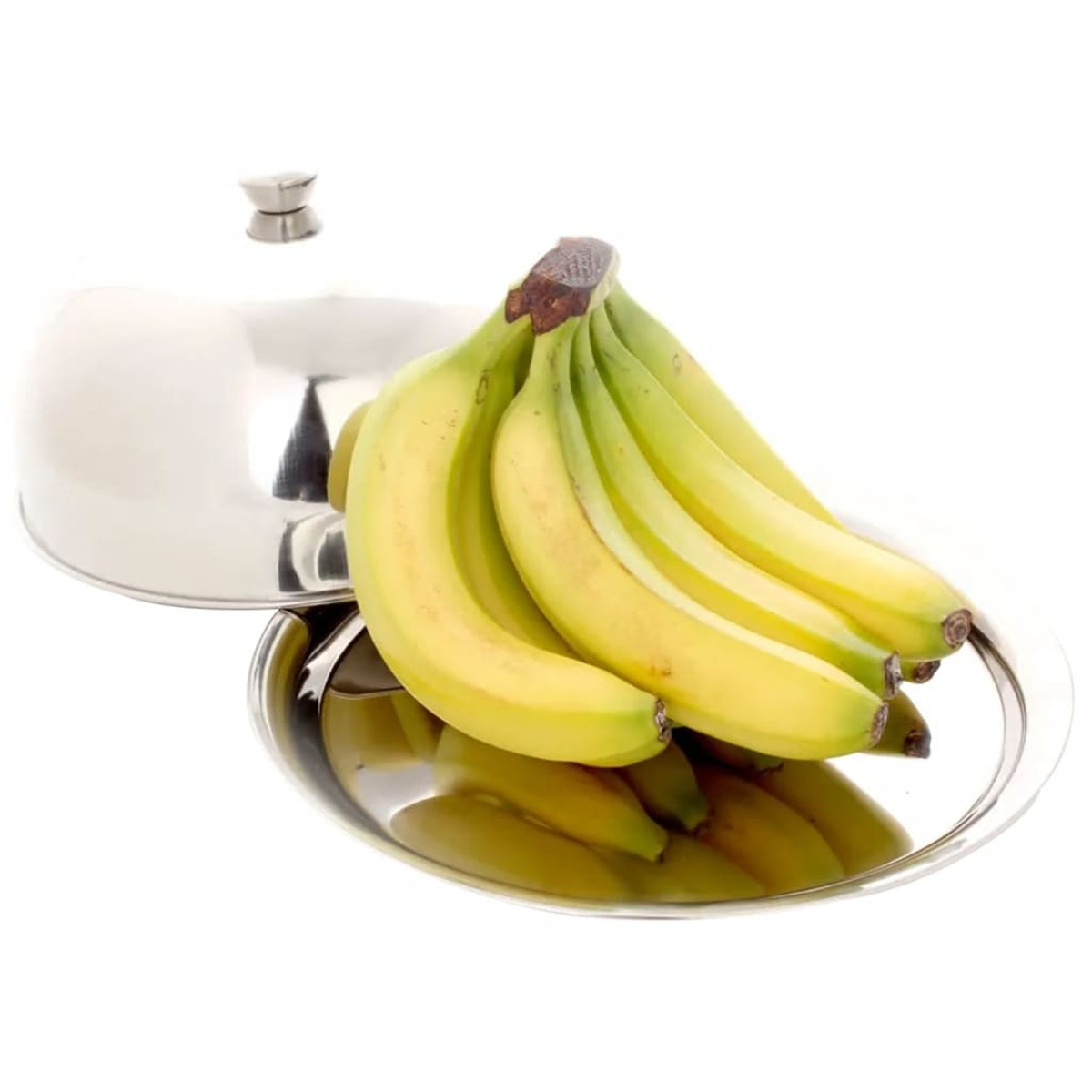 Ein Bund Bananen liegt auf einer silbernen Platte neben einem silbernen Deckel. Die Bananen sind gelb und grün.