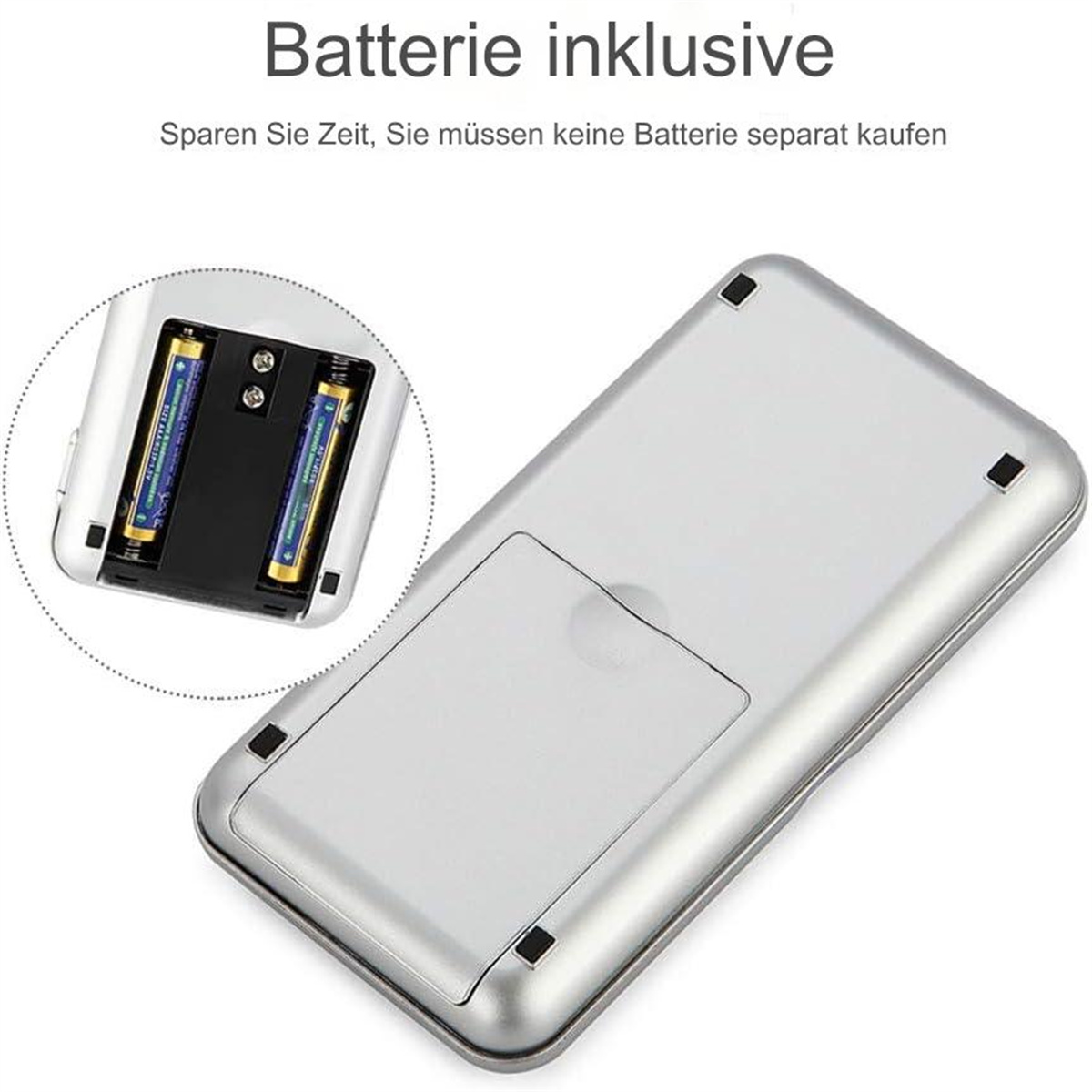 Eine silberne Waage mit Batteriefach, das zwei AAA-Batterien zeigt. Der Text oben lautet 'Batterie inklusive'.