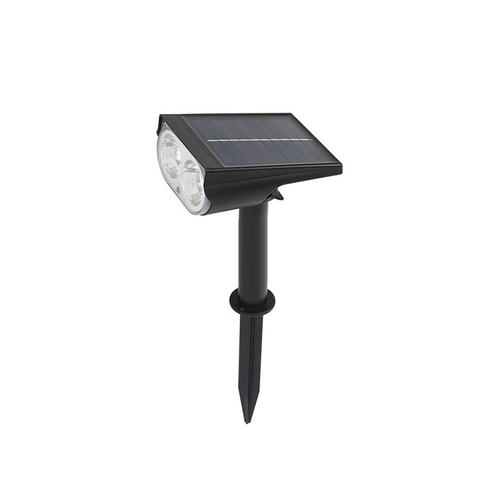 Eine schwarze, solarbetriebene Gartenleuchte. Sie hat ein Solarpanel oben, zwei LED-Leuchten und einen Erdspieß.