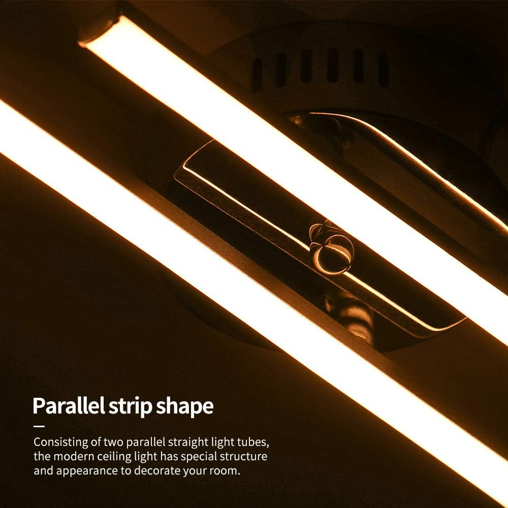 Zwei parallele, beleuchtete Leuchtröhren bilden eine Deckenleuchte. Der Hintergrund ist dunkel. Das Licht hat ein schlankes, modernes Design.