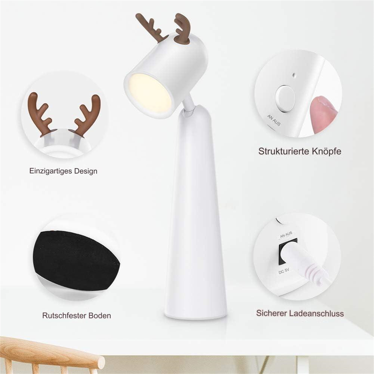 Eine weiße, hirschförmige Schreibtischlampe mit braunen Geweihen und einem leuchtenden Licht. Merkmale sind strukturierte Knöpfe, rutschfester Boden und Ladeanschluss.