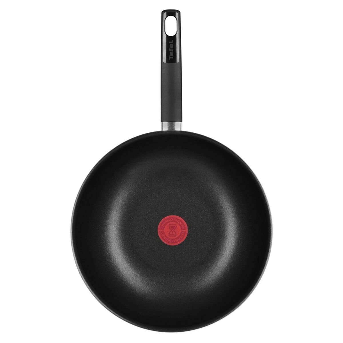 Vista superior de una sartén Tefal negra. Tiene un mango largo y un círculo rojo Thermo-Signal en el centro.