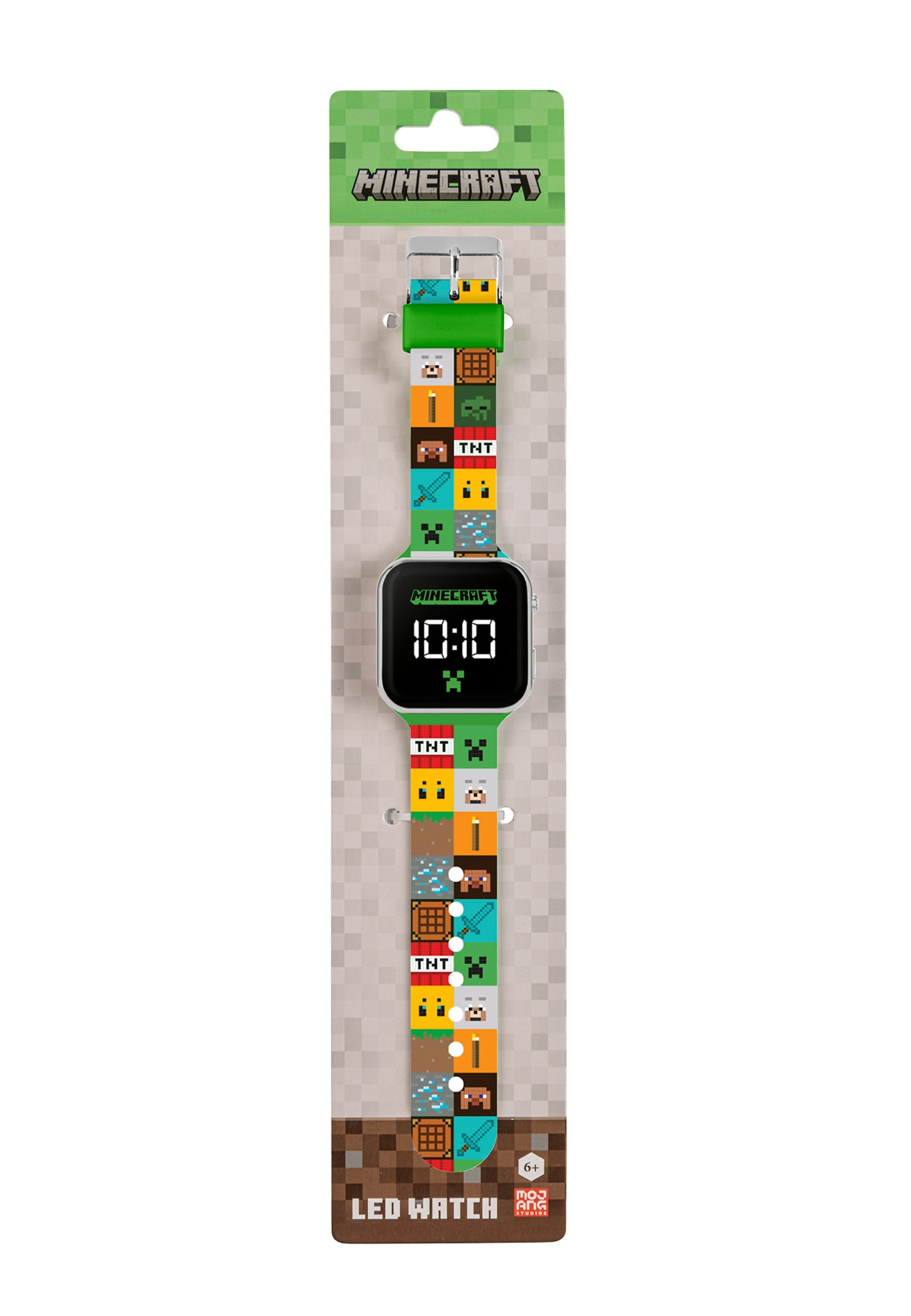 Minecraft LED-Uhr auf der Verpackung. Das Uhrenarmband hat Minecraft-Grafiken. Das Zifferblatt zeigt die Uhrzeit an. Die Verpackung hat das Minecraft-Logo.