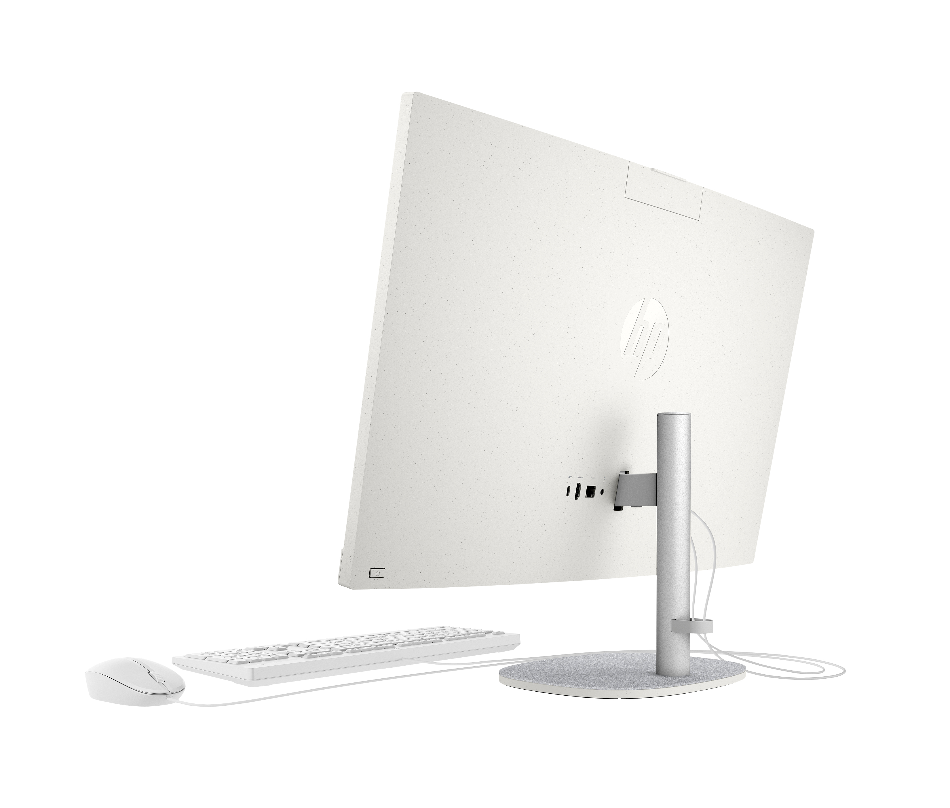 Un computer HP all-in-one bianco. Tastiera e mouse in primo piano. Lo schermo è sullo sfondo.