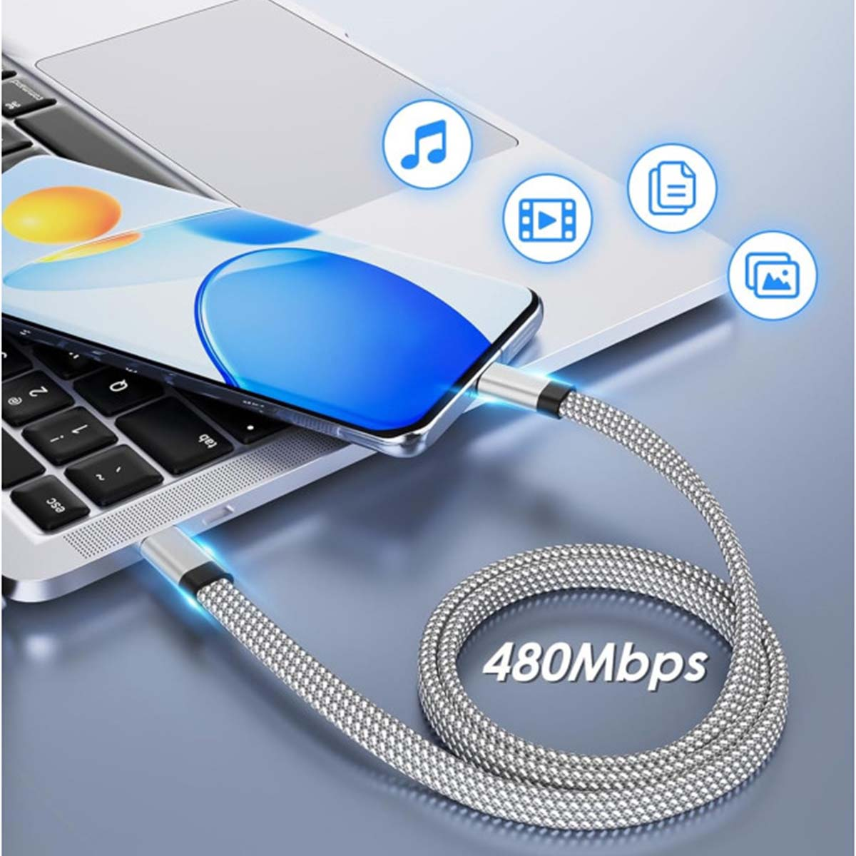 Un téléphone connecté à un ordinateur portable avec un câble. Icônes de musique, vidéo, document et images flottent. Le câble affiche '480Mbps'.