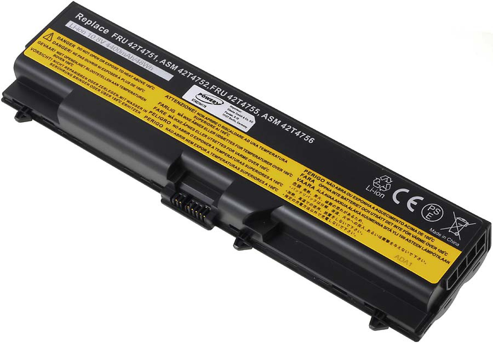 Batería negra de portátil con etiquetas de advertencia. Incluye texto en varios idiomas, avisos de calor y un conector.