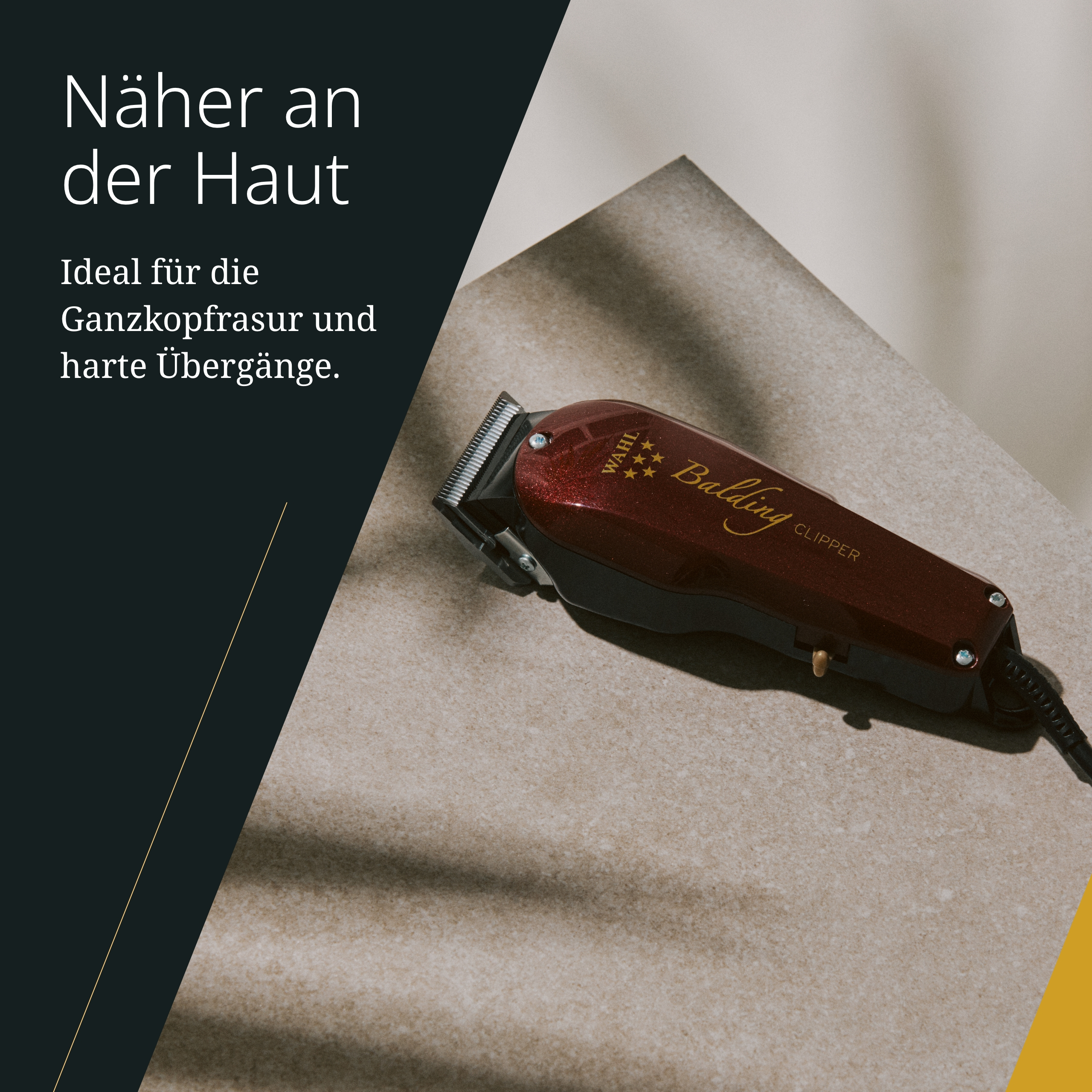 Ein kastanienroter Wahl Balding Clipper liegt auf einer beigen Oberfläche mit dunklem Hintergrund und gelbem Akzent.