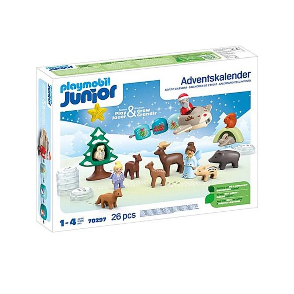 Playmobil Junior Adventskalenderbox. Enthält Figuren von Tieren, einem Weihnachtsmann und einem Weihnachtsbaum, alles in einer Winterszene.
