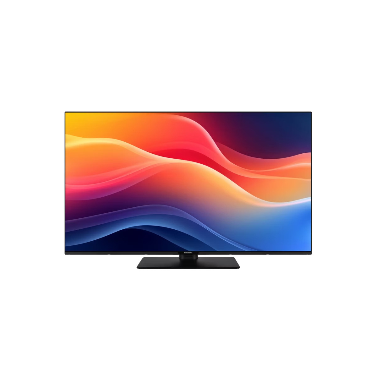 Telewizor Panasonic wyświetla kolorowy abstrakcyjny obraz z falami czerwieni, pomarańczy, błękitu i fioletu. Telewizor stoi na czarnym stojaku.