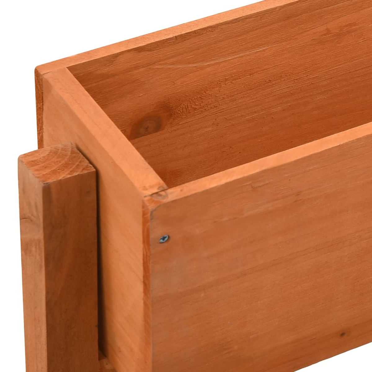 Nahaufnahme einer hölzernen Pflanzkasten. Die Box ist rechteckig, mit sichtbarer Holzmaserung. Sie ist unfertig und hellbraun.