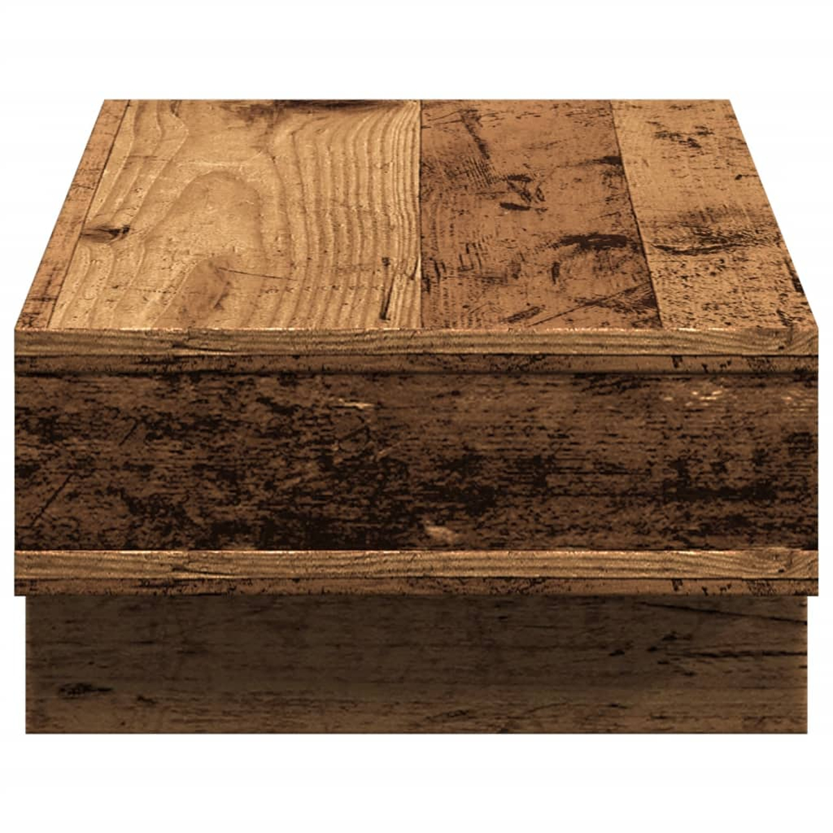 Ein Holztisch mit braunem Farbton, der die Maserung des Holzes zeigt. Der Tisch hat eine rechteckige Form und einen Schatten.