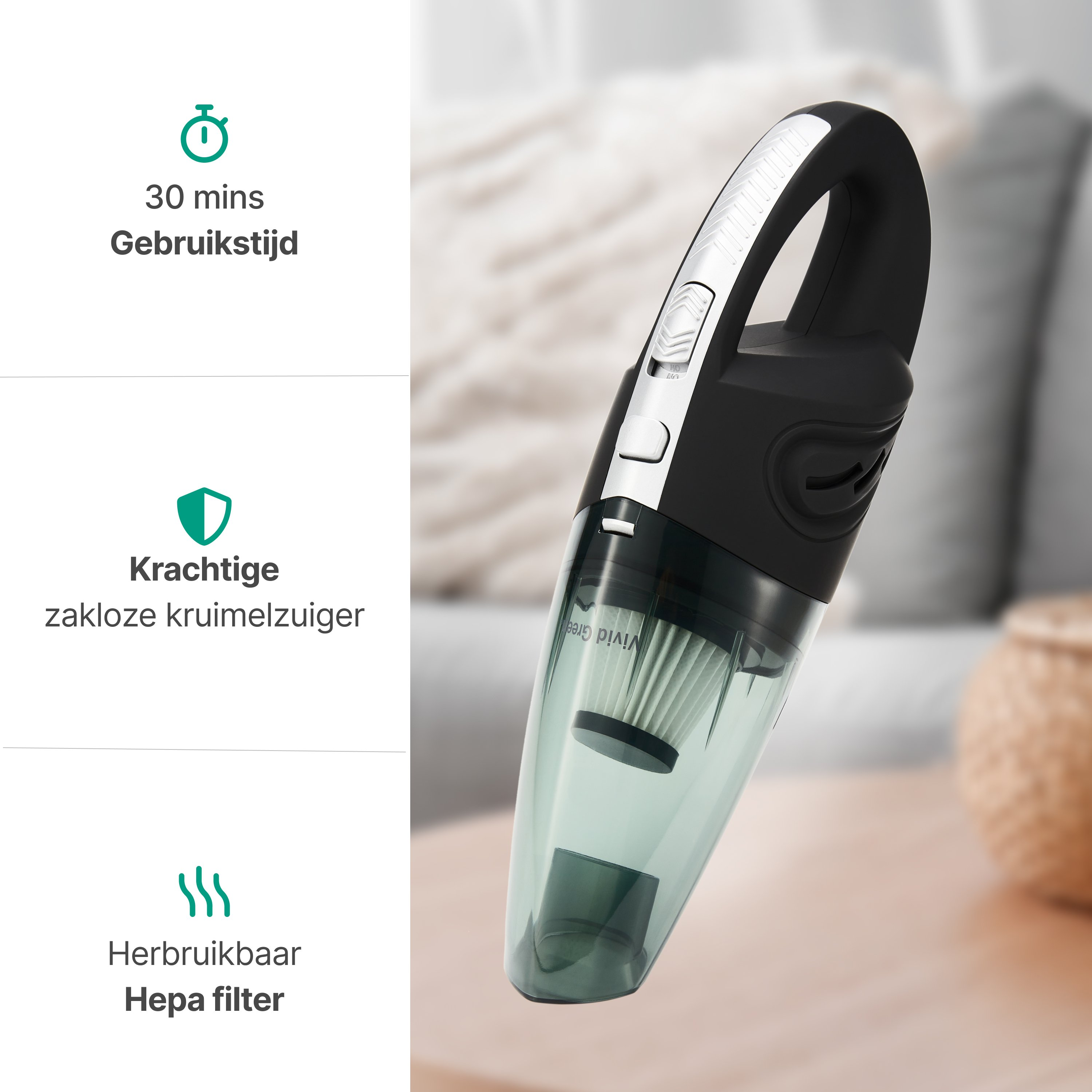 Un aspirateur à main noir et vert. L'arrière-plan montre un canapé et une table flous.