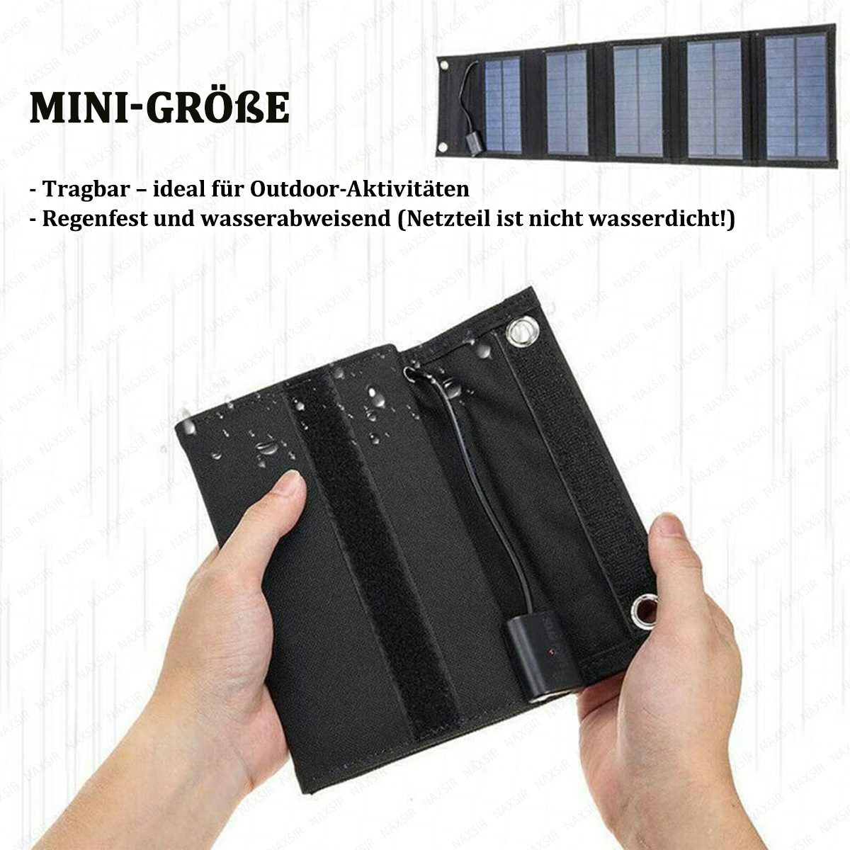 Eine Person hält ein schwarzes, faltbares Solarpanel. Das Panel ist geöffnet und zeigt ein angeschlossenes Ladegerät. Oben steht 'MINI-GRÖBE'.