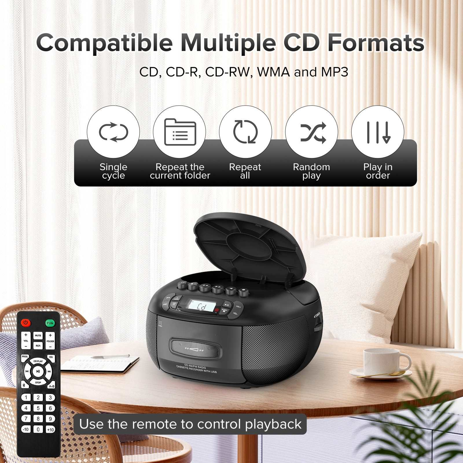 Schwarzer CD-Player mit Fernbedienung auf einem Tisch. Enthält CD, CD-R, CD-RW-Formate und mehrere Funktionen.