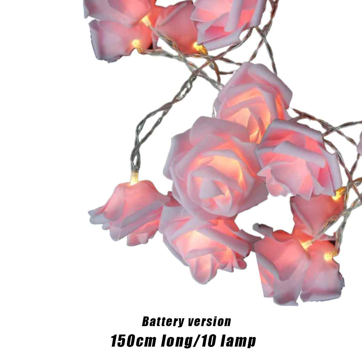 Kette aus rosa rosenförmigen Lichtern. Die Lichter sind an einem silbernen Draht. Text unten: 'Batterieversion 150cm lang/10 Lampe'.