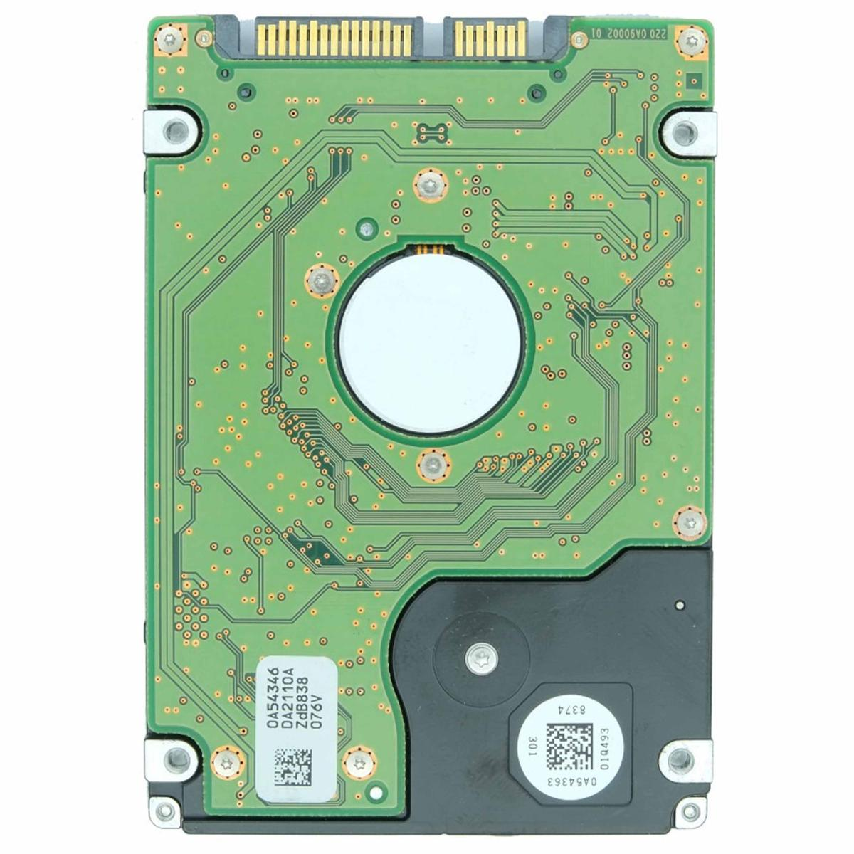 Un circuito stampato verde con tracce di rame, un cerchio bianco e un componente nero. Sono visibili diverse etichette e connettori.