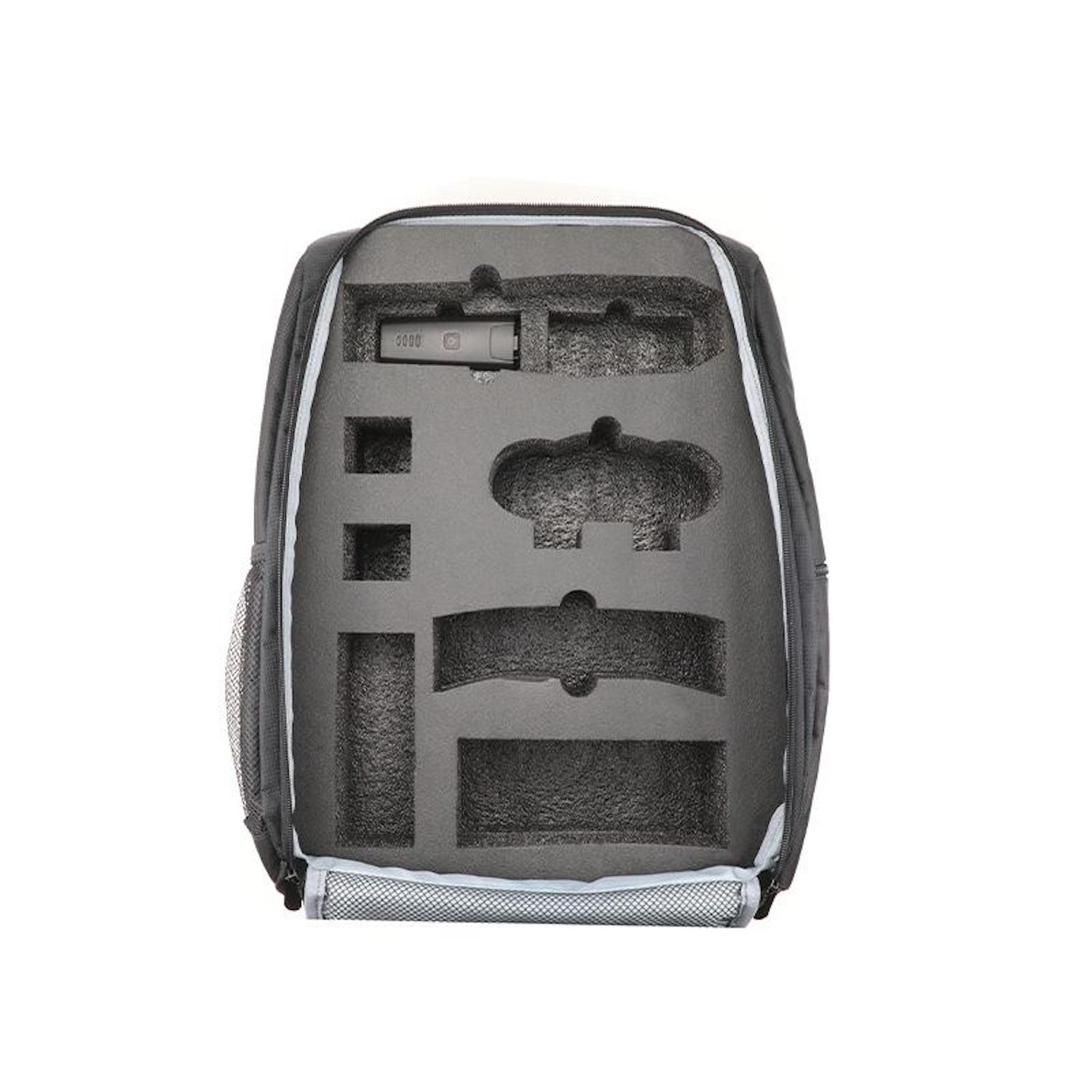 Innenraum eines grauen Rucksacks, der einen individuellen Schaumstoffeinsatz mit verschiedenen Fächern zeigt. Der Schaumstoff ist dunkelgrau.