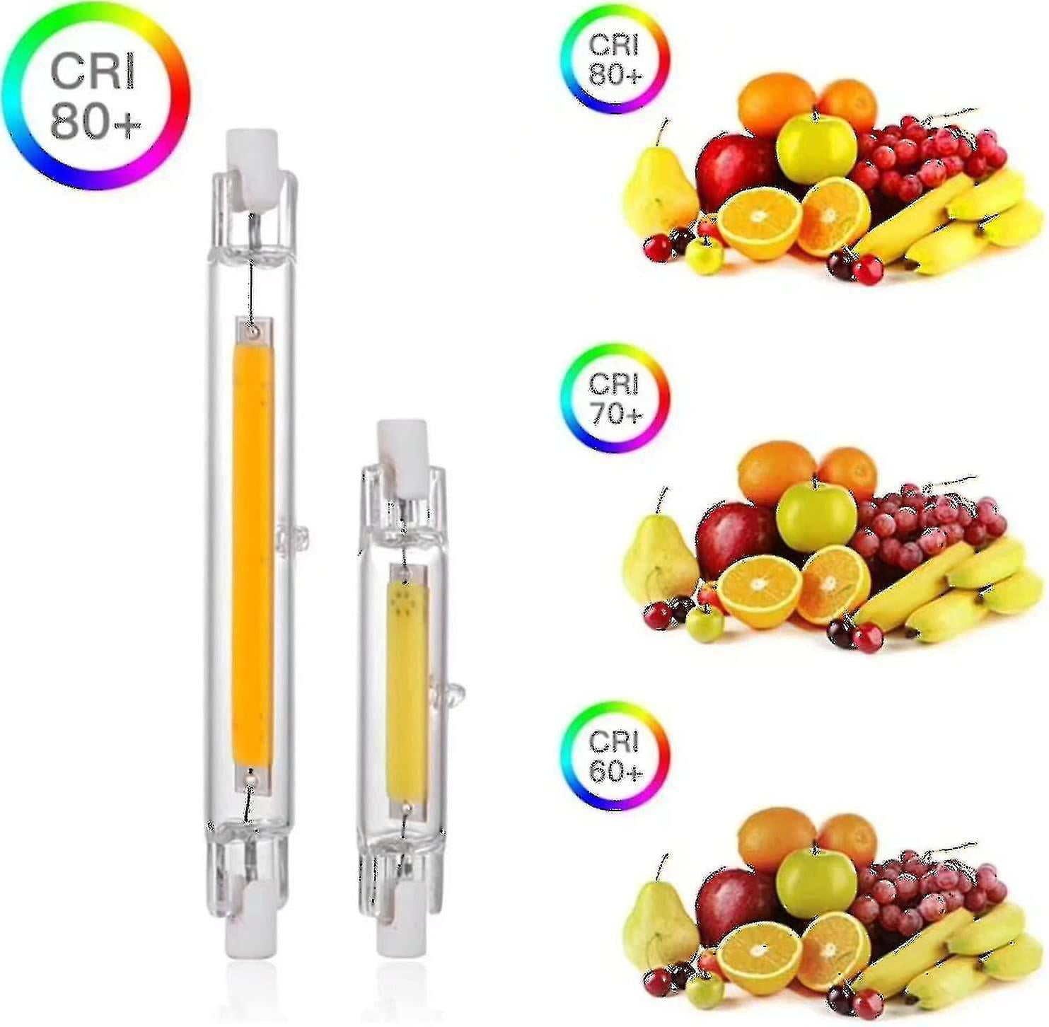 Das Bild zeigt zwei LED-Lampen neben Fruchtarrangements. Die Lampen sind vertikal mit gelben Kernen. Zu den Früchten gehören Orangen, Äpfel und Trauben.