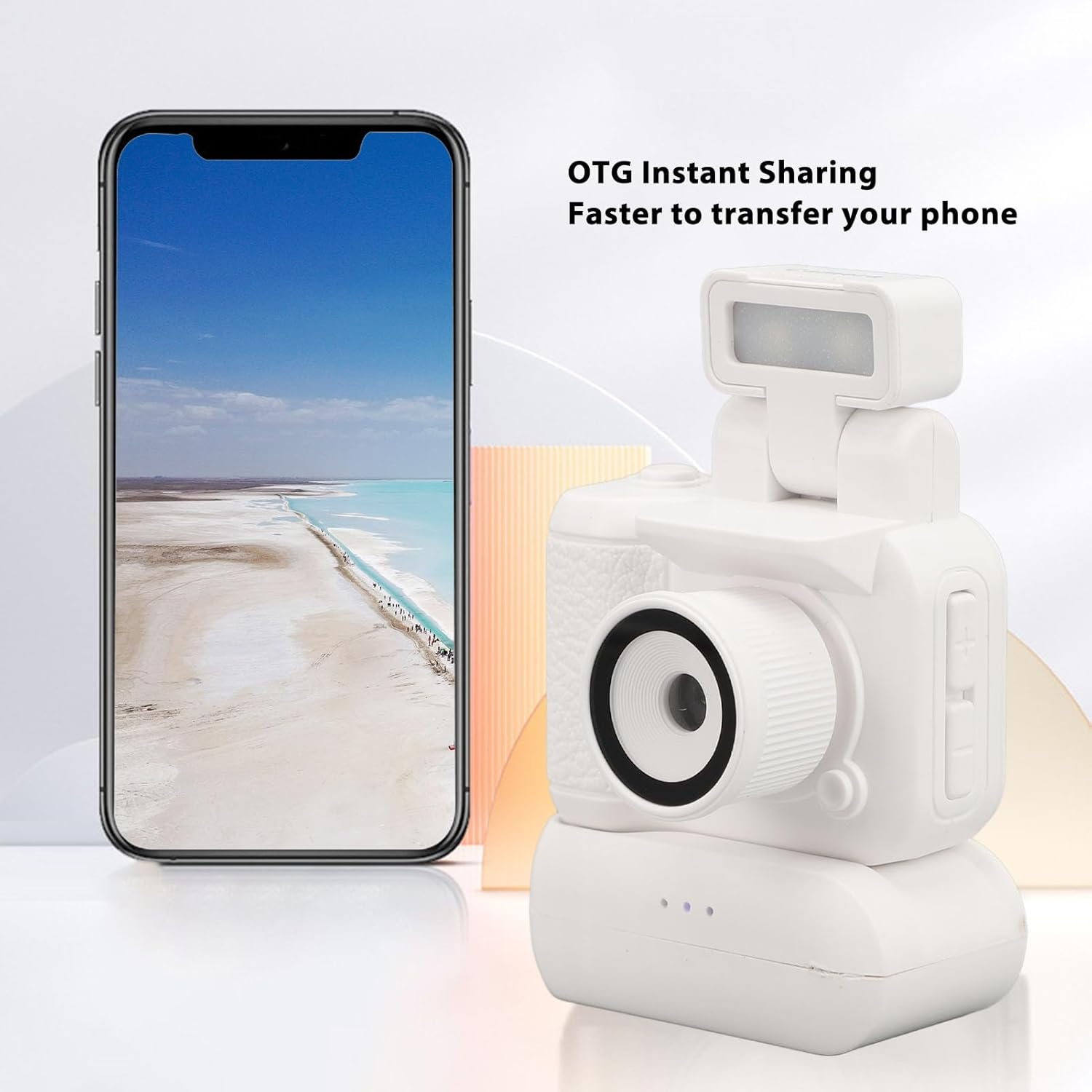 Ein Telefon zeigt eine Strandszene. Ein weißes kameraähnliches Gerät mit Licht steht neben dem Telefon. Text: 'OTG Instant Sharing'.