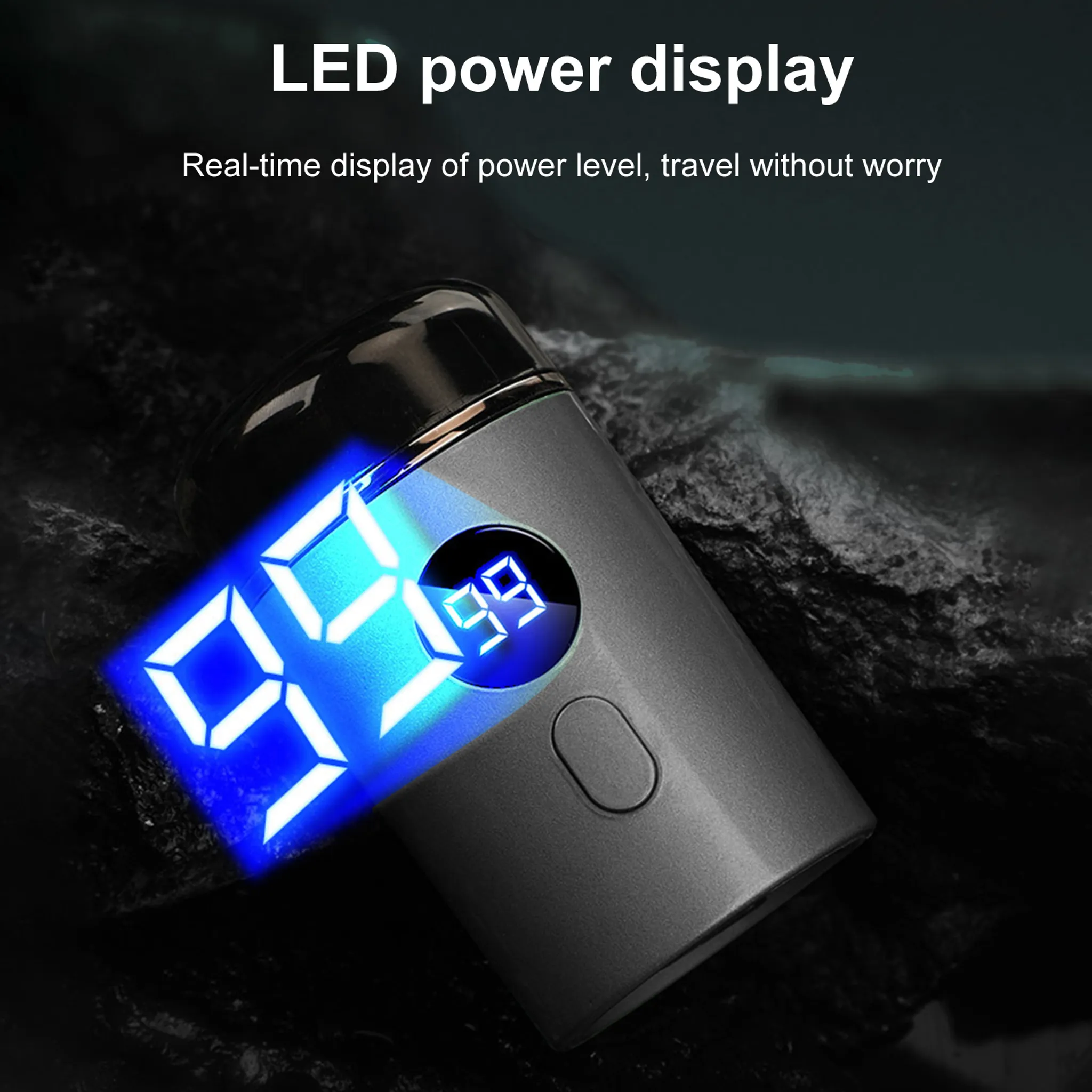 Ein grauer Elektrorasierer mit blauem LED-Display, das 99 % Akku anzeigt. Der Hintergrund ist dunkel, was auf eine Produktaufnahme hindeutet.