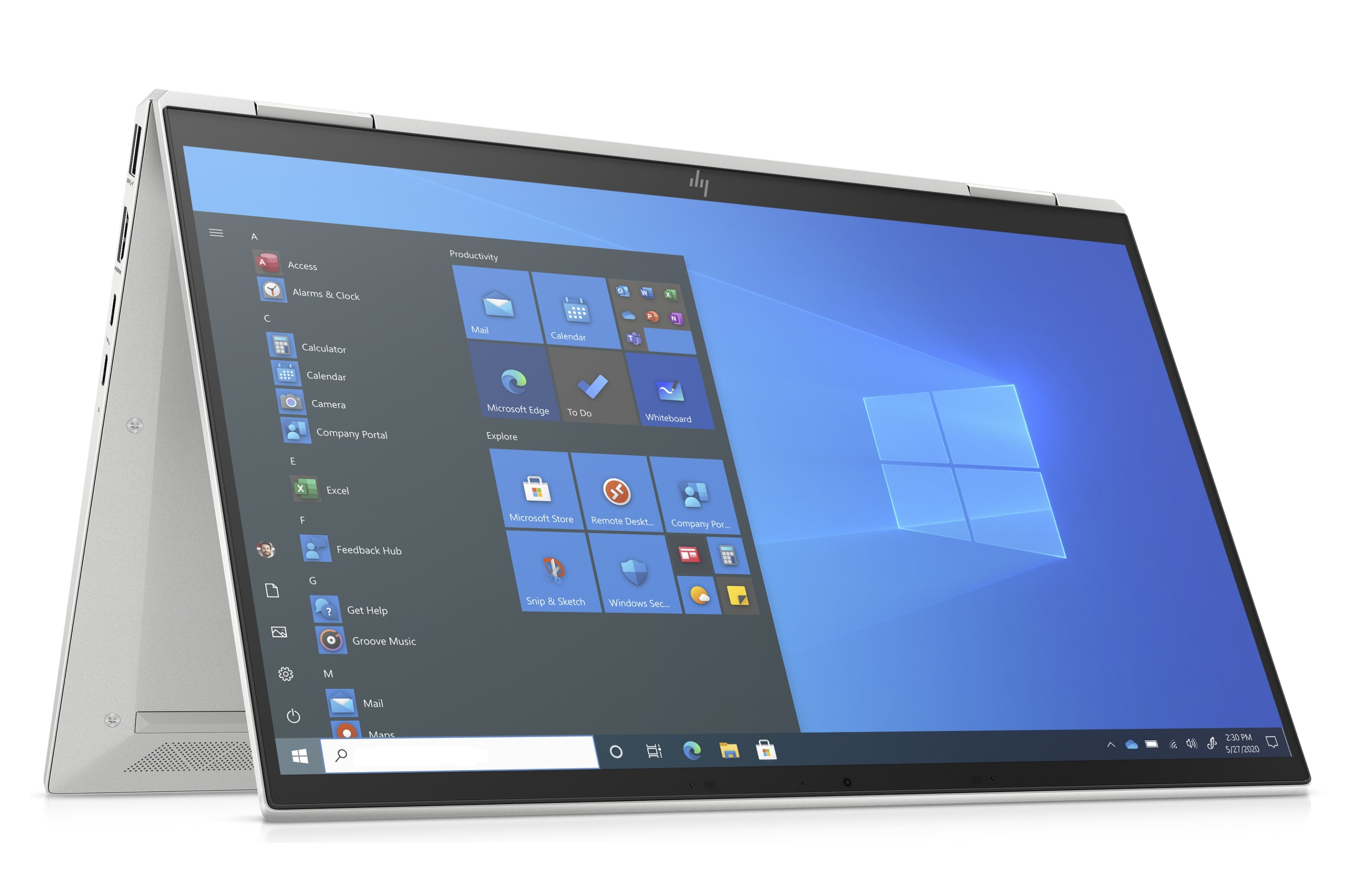 Silberner Laptop mit geöffneter Windows 10-Oberfläche. Symbole für Apps wie Mail, Kalender und Microsoft Edge sind sichtbar.