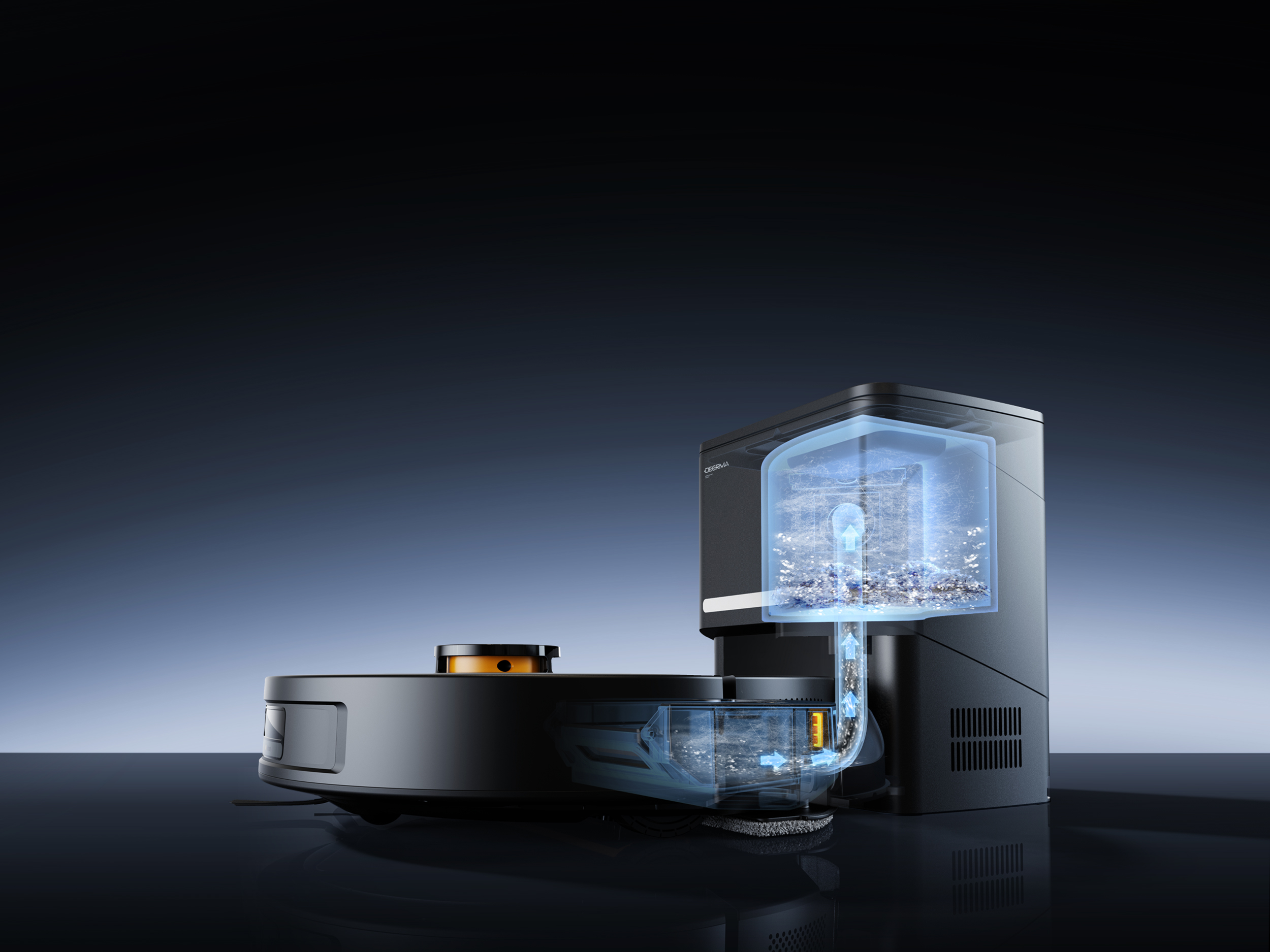 Czarny odkurzacz robot z stacją czyszczącą. Odkurzacz ma pomarańczowe akcenty. Przezroczyste sekcje pokazują wnętrze.