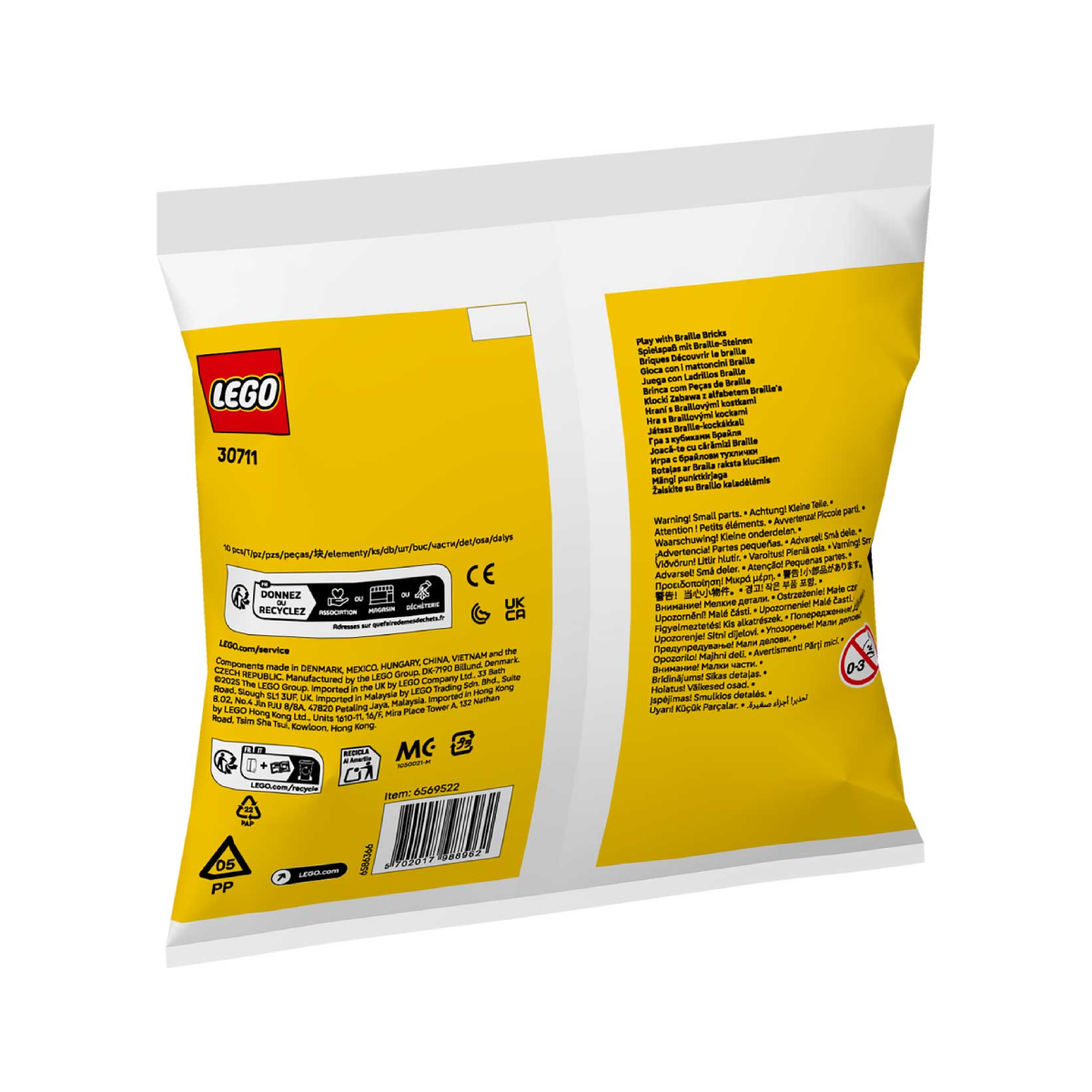Een LEGO Braille Bricks zak. De zak is geel met tekst en het LEGO-logo. Het toont een leeftijdscategorie van 0-3 jaar.