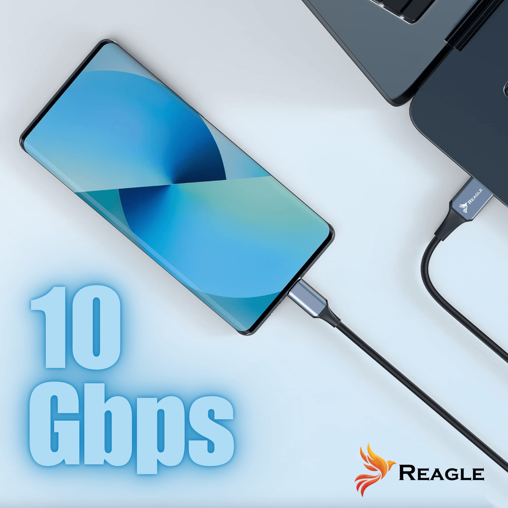 Telefon i laptop połączone kablem z adapterem Reagle. Na obrazku widnieje napis '10 Gbps'.