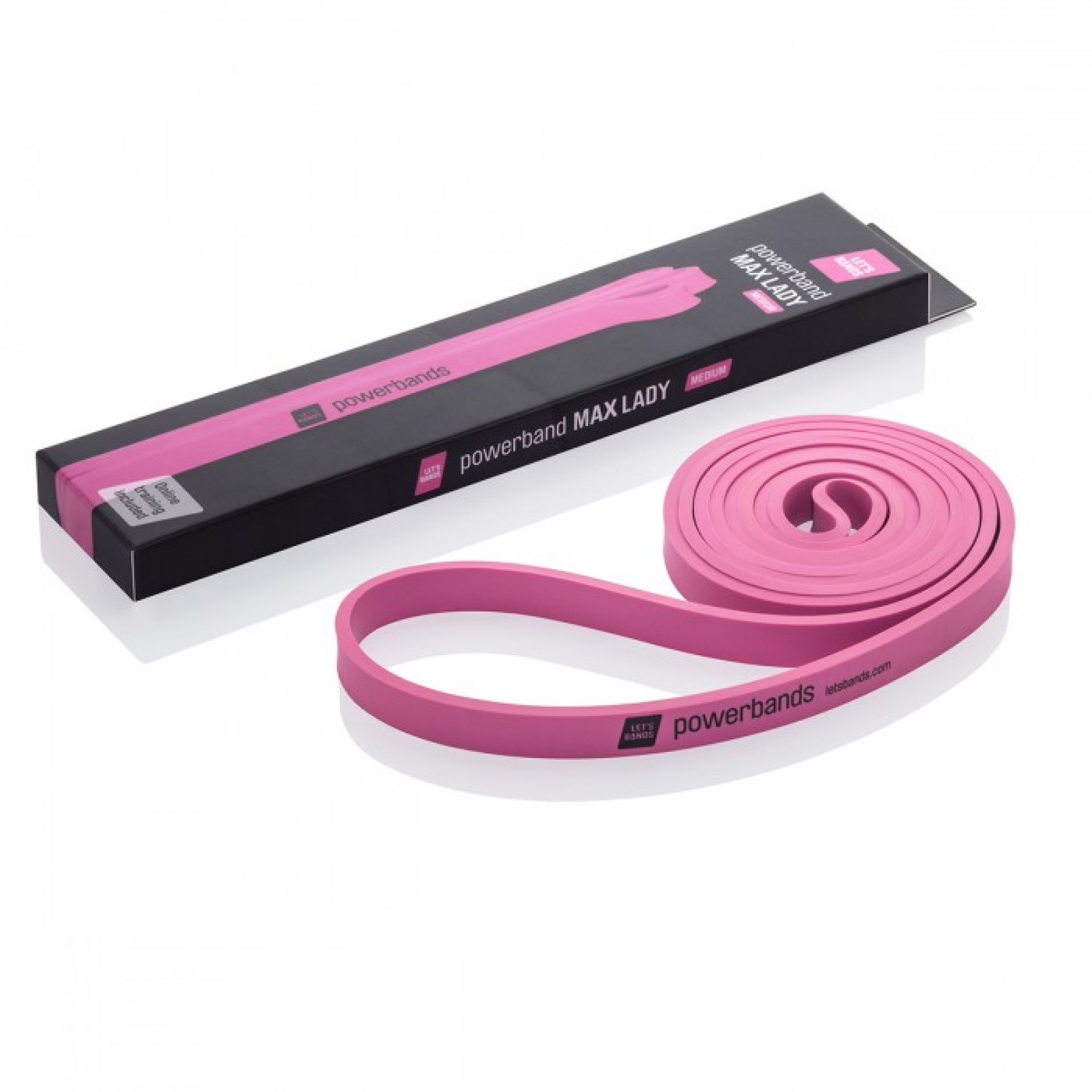 Ein rosa Powerband und seine schwarze Box liegen auf einer weißen Oberfläche. Auf der Box steht 'powerband MAX LADY'.