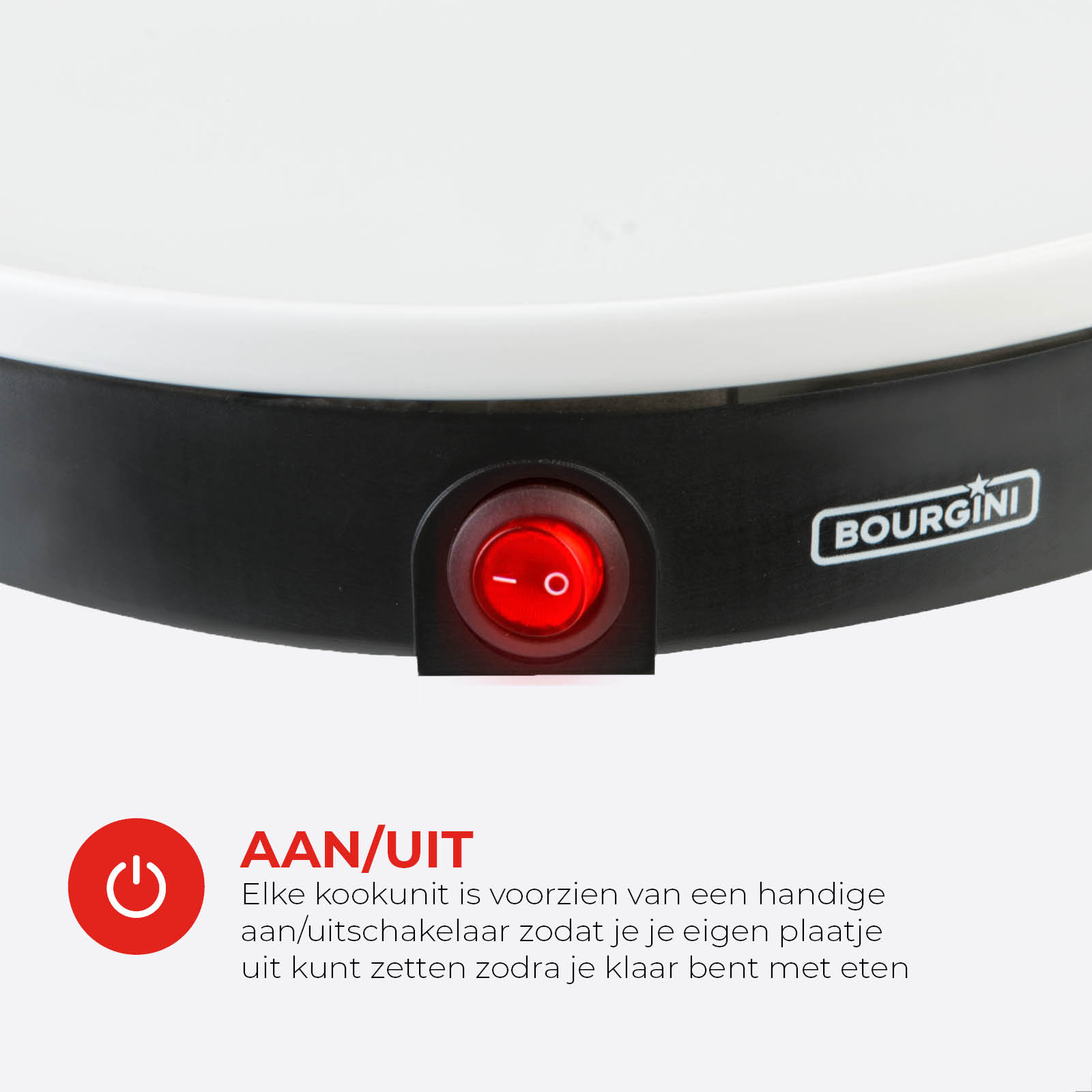 Close-up of a black and white appliance with a red power button. The brand name is visible.