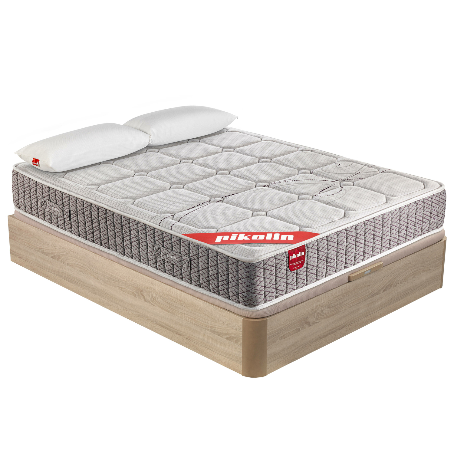 Una cama con almohadas blancas, un colchón con patrón acolchado y una base de madera. La marca 'pikolin' es visible.