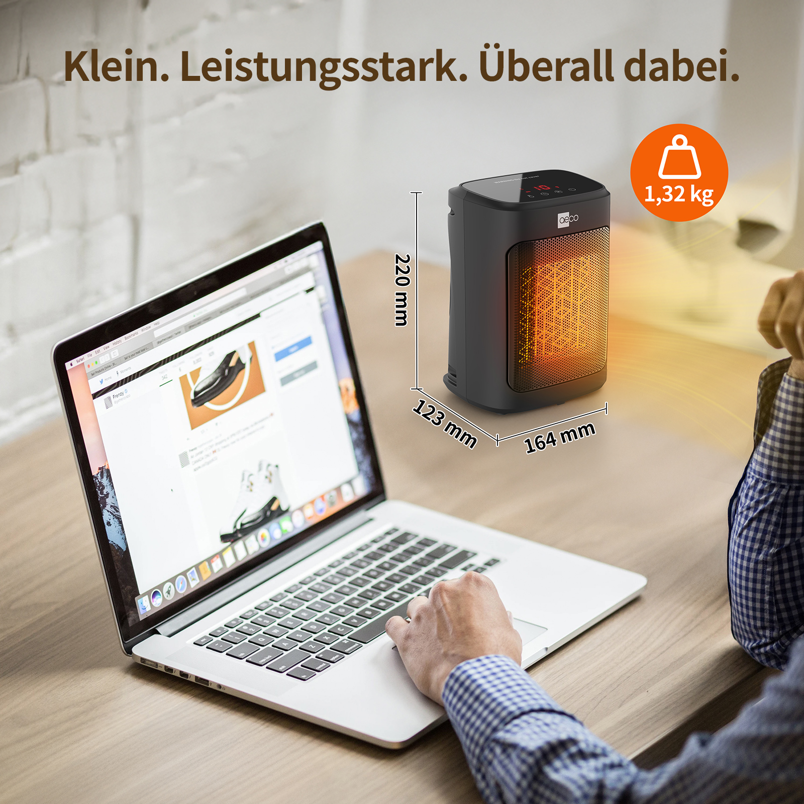 Eine Person benutzt einen Laptop neben einem schwarzen Heizgerät. Die Abmessungen des Heizgeräts werden angezeigt.