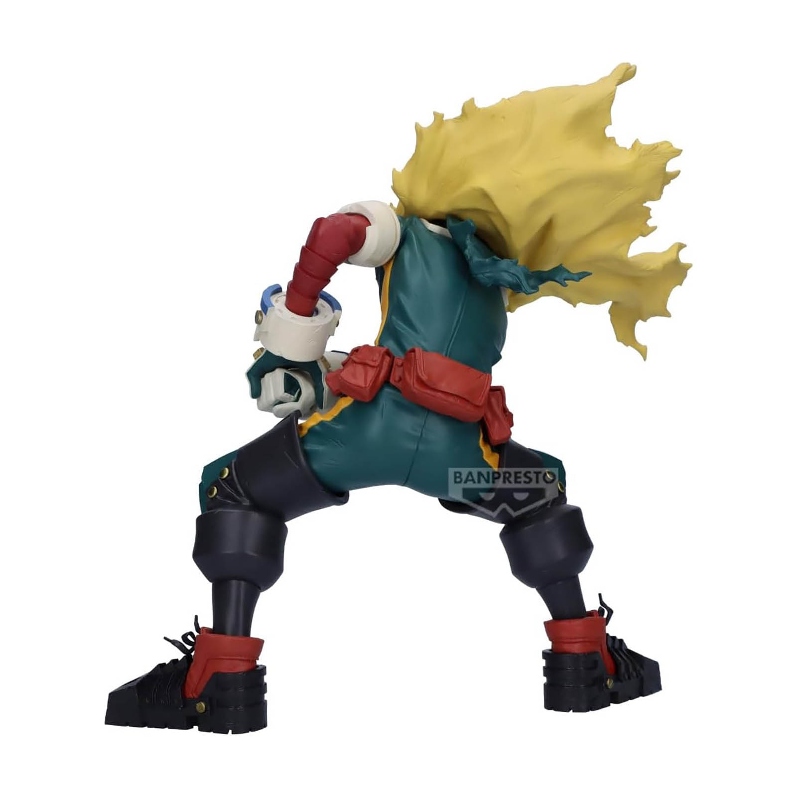 Figura de héroe en pose de acción, con traje verde y rojo, con capa de pelo amarillo. Botas negras. Fondo blanco.