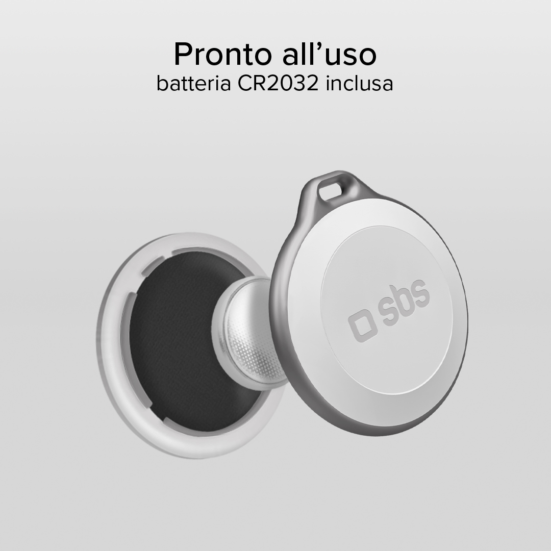 Un rastreador abierto con batería. El dispositivo tiene una cubierta blanca con el logotipo "sbs" y un anillo interior negro.