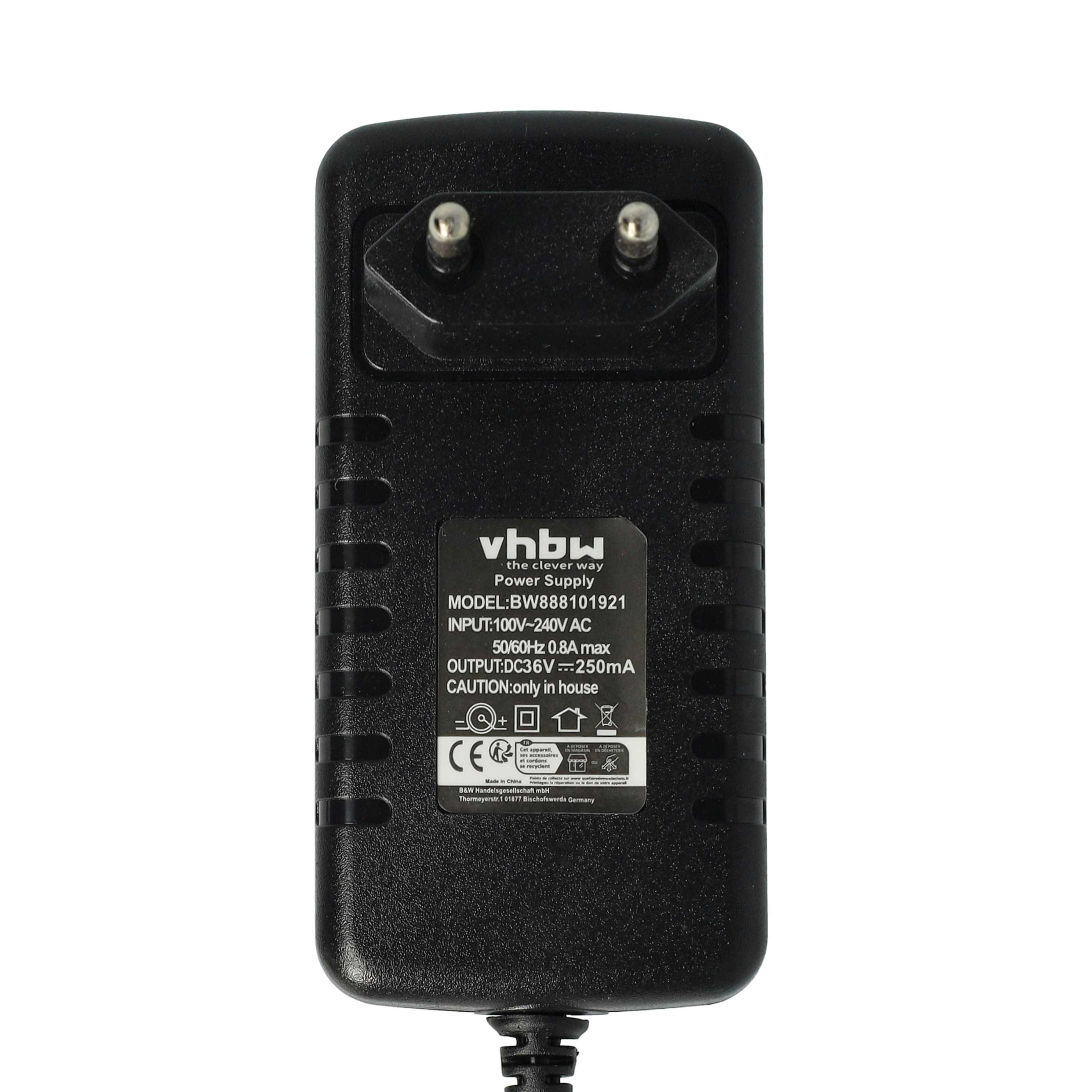 Ein schwarzer Netzadapter mit zwei Stiften. Er enthält Text mit Marke, Modell, Eingangs- und Ausgangsdetails.