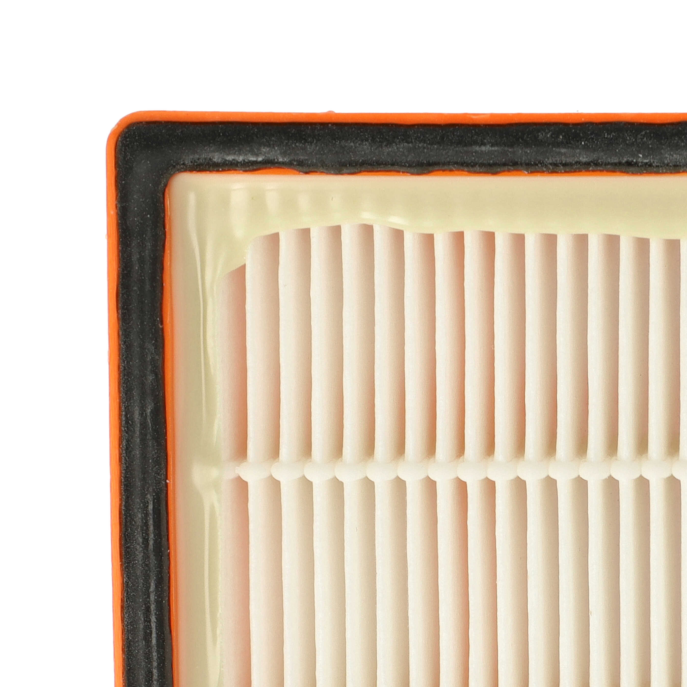 Nahaufnahme eines Luftfilters. Er hat einen schwarzen Rand, einen orangefarbenen Rahmen und cremefarbenes, plissiertes Filtermaterial.