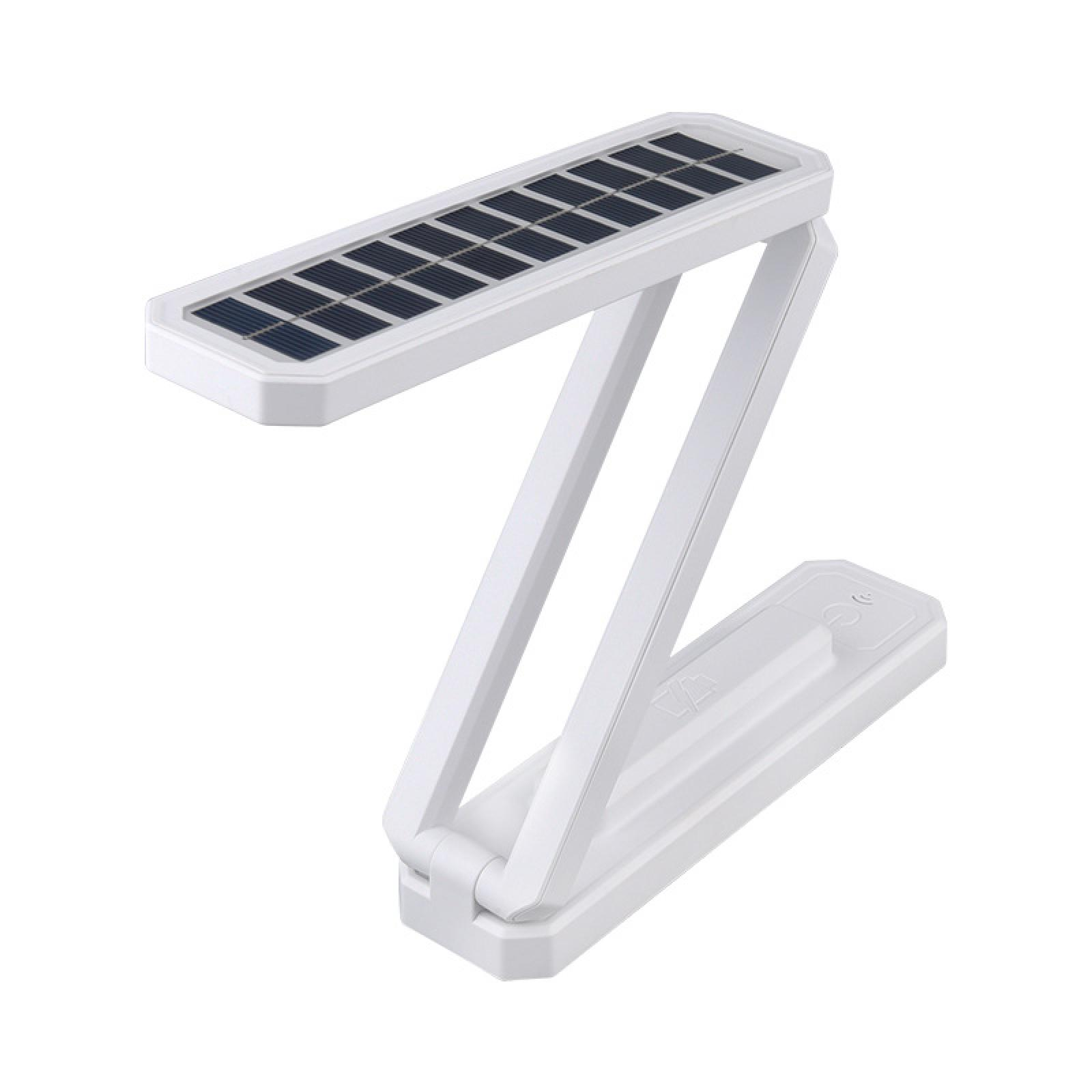Eine weiße, solarbetriebene Schreibtischlampe. Das obere Panel hat Solarzellen. Es faltet sich in Z-Form.