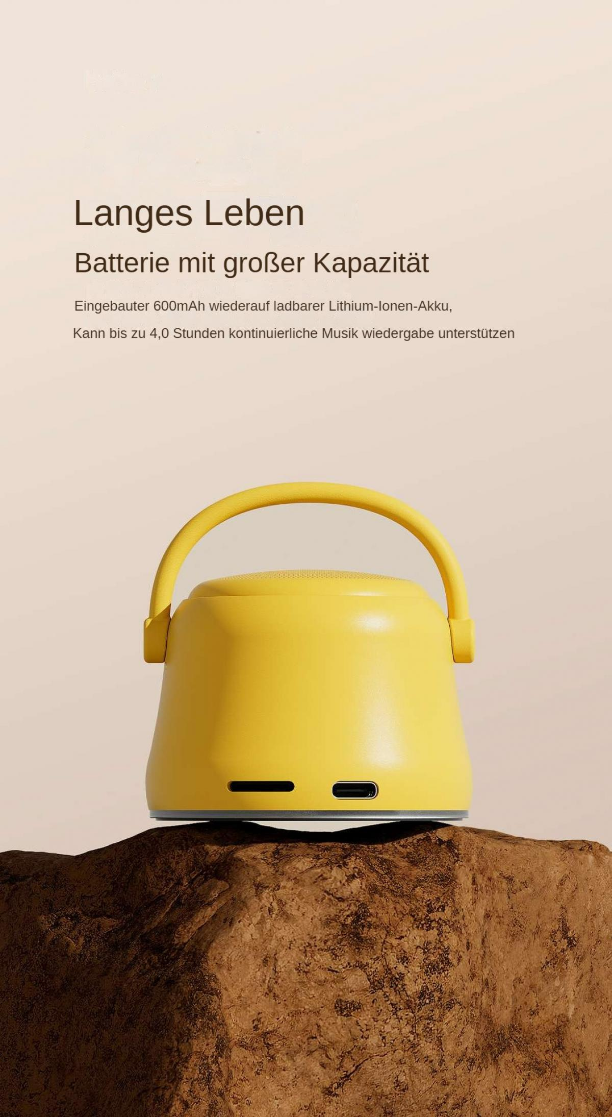 Ein gelber Lautsprecher mit Griff steht auf einem braunen Felsen. Text auf Deutsch beschreibt Akkukapazität und Musikwiedergabezeit.