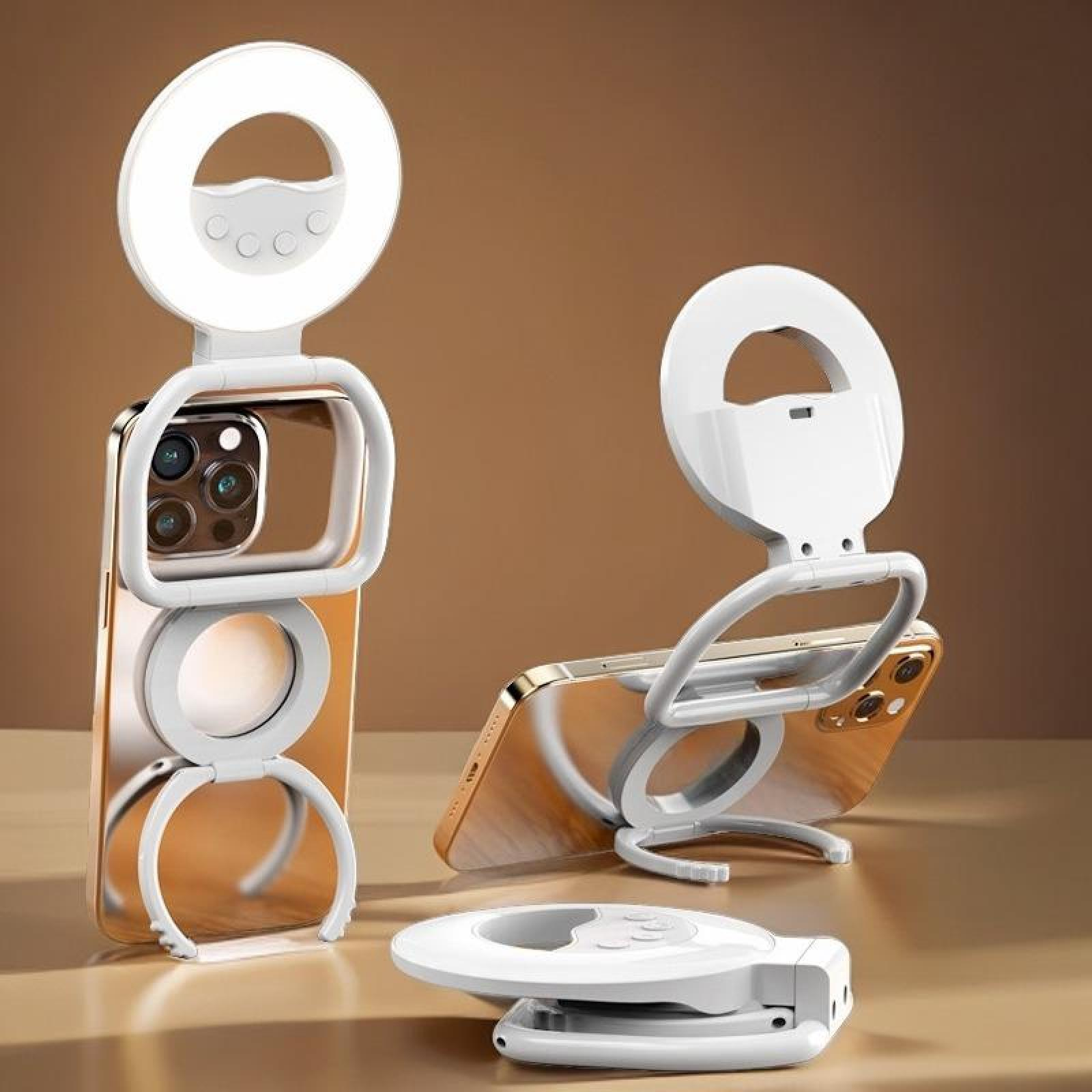 Drei weiße Ringlichter mit Telefonhaltern. Ein Telefon steht aufrecht, zwei sind abgewinkelt. Brauner Hintergrund.